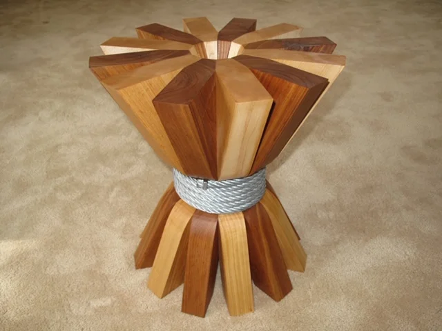 Kim Roberts and an example of his furniture making. "Squeezing more traffic through the cable: Maple, Cherry and stainless steel," he says. Source: Kim Roberts.