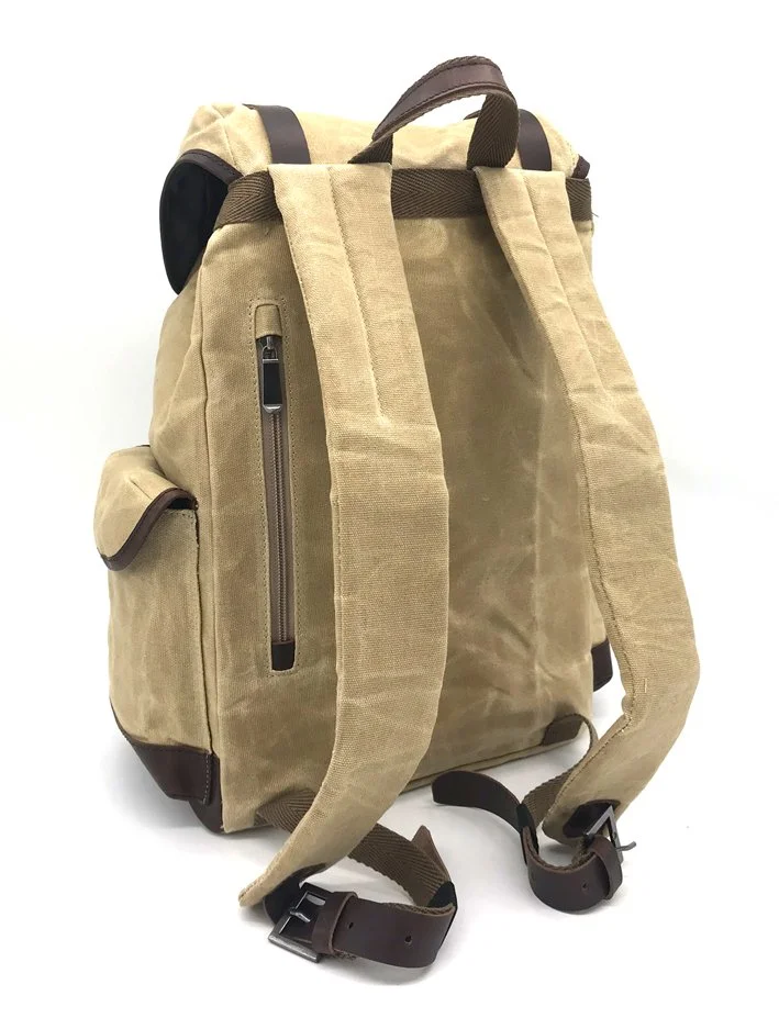  18L backpack using 14oz RPET canvas as main fabric and full printed 150D as a lining. Waxed leather trims.   Made for Nature  Nature &amp; Découvertes © 