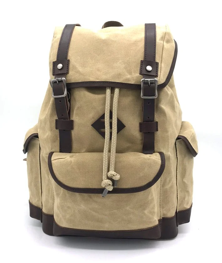  18L backpack using 14oz RPET canvas as main fabric and full printed 150D as a lining. Waxed leather trims.  Made for Nature  Nature &amp; Découvertes © 