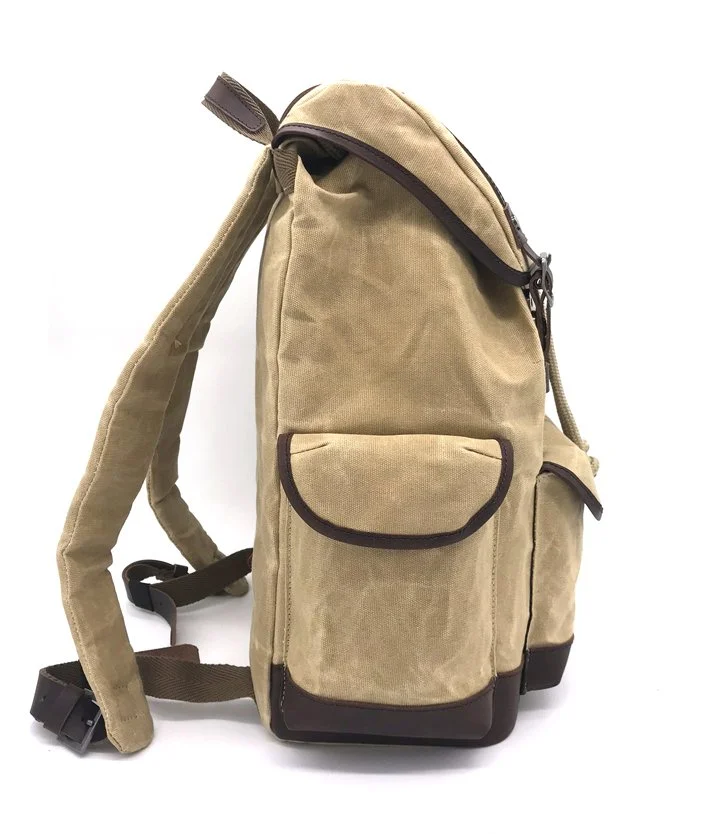  18L backpack using 14oz RPET canvas as main fabric and full printed 150D as a lining. Waxed leather trims.   Made for Nature  Nature &amp; Découvertes © 