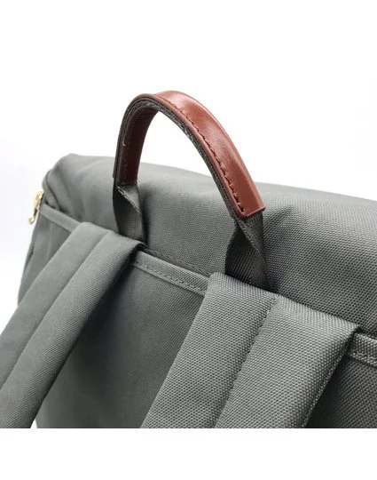 Backpack for salesman : detail of the leather handle  Using 900D Rpet as main fabric and 300D Rpet as lining. Leather trims.  Made for Ruinart® 