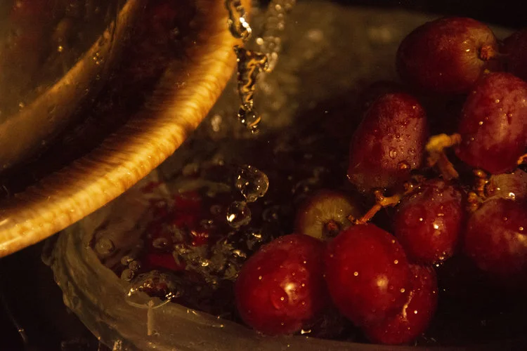 Washing+Grapes+in+a+Sink+Full+of+Dishes.jpg