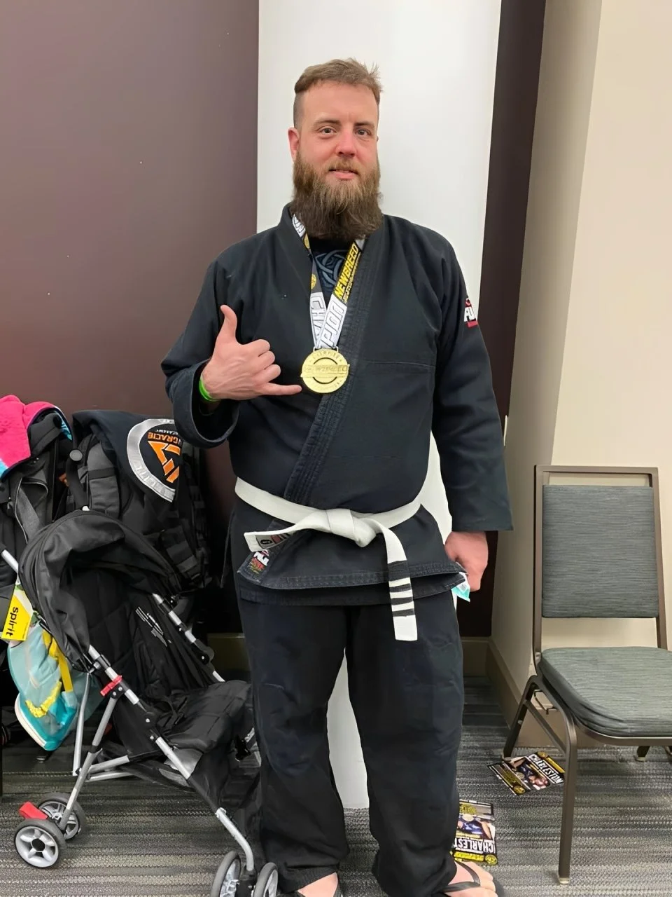 Brazilian jiu-jitsu tournament gold medalist after a 130-pound weight loss.