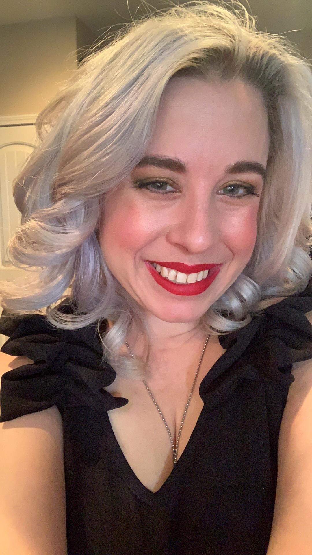 Co-parenting advocate woman smiling in a portrait photo.