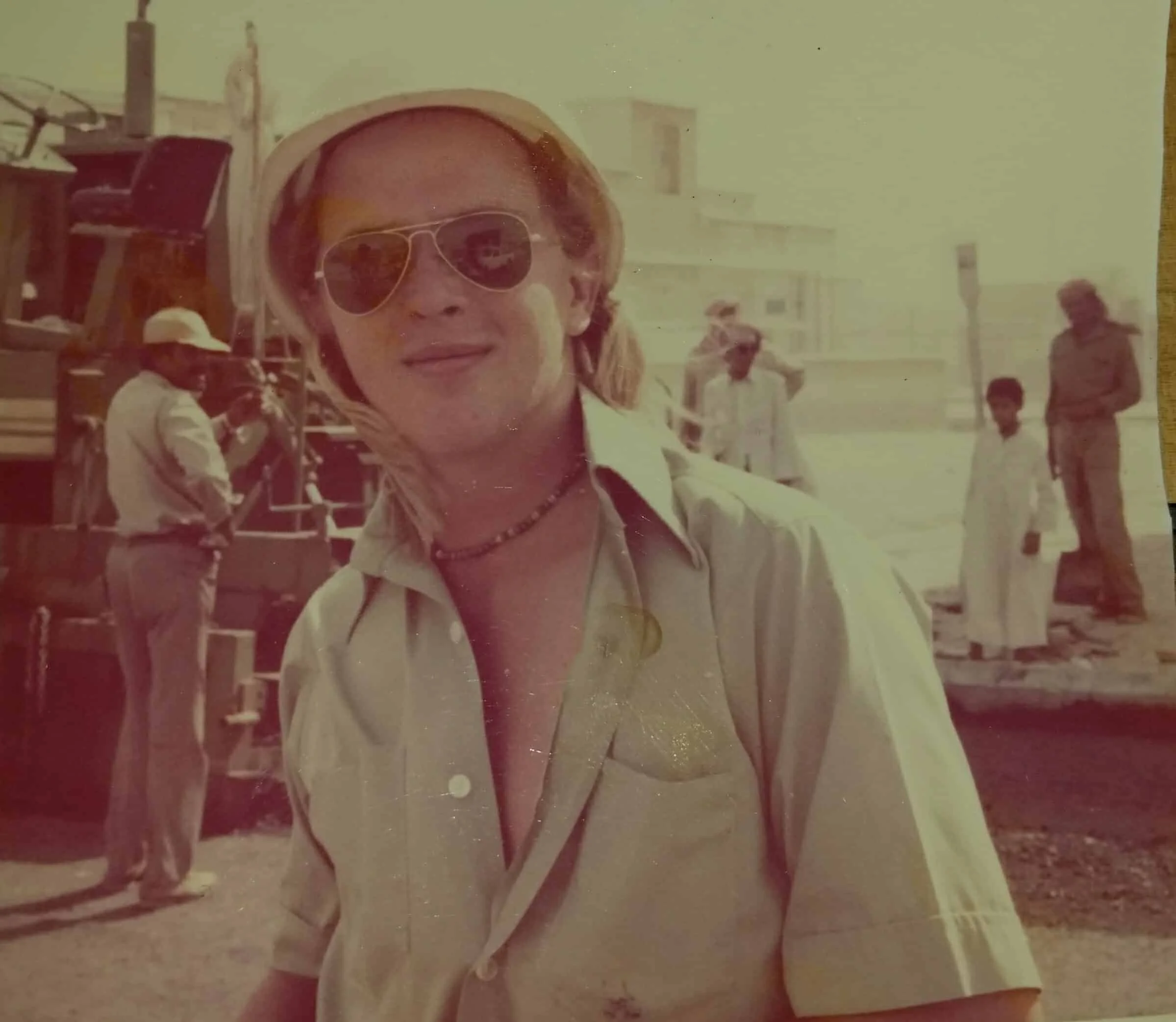Vintage photo of man working on construction crew in the 1970s.