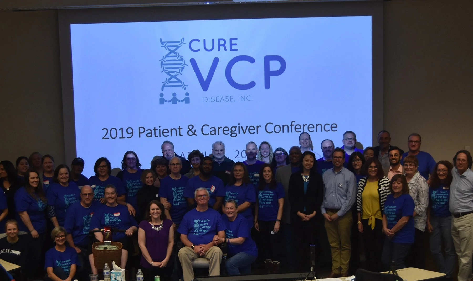 Attendees and organizers gathered for a rare disease patient and caregiver conference hosted by Cure VCP Disease.
