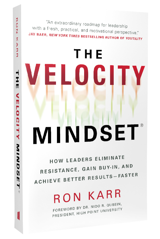 Book cover of The Velocity Mindset by Ron Karr, a leadership book about gaining buy-in and achieving results faster.