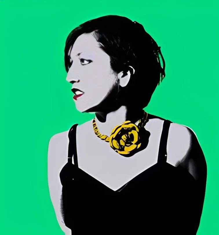 Stylized portrait of a woman in black against a bright green background wearing a yellow flower necklace.