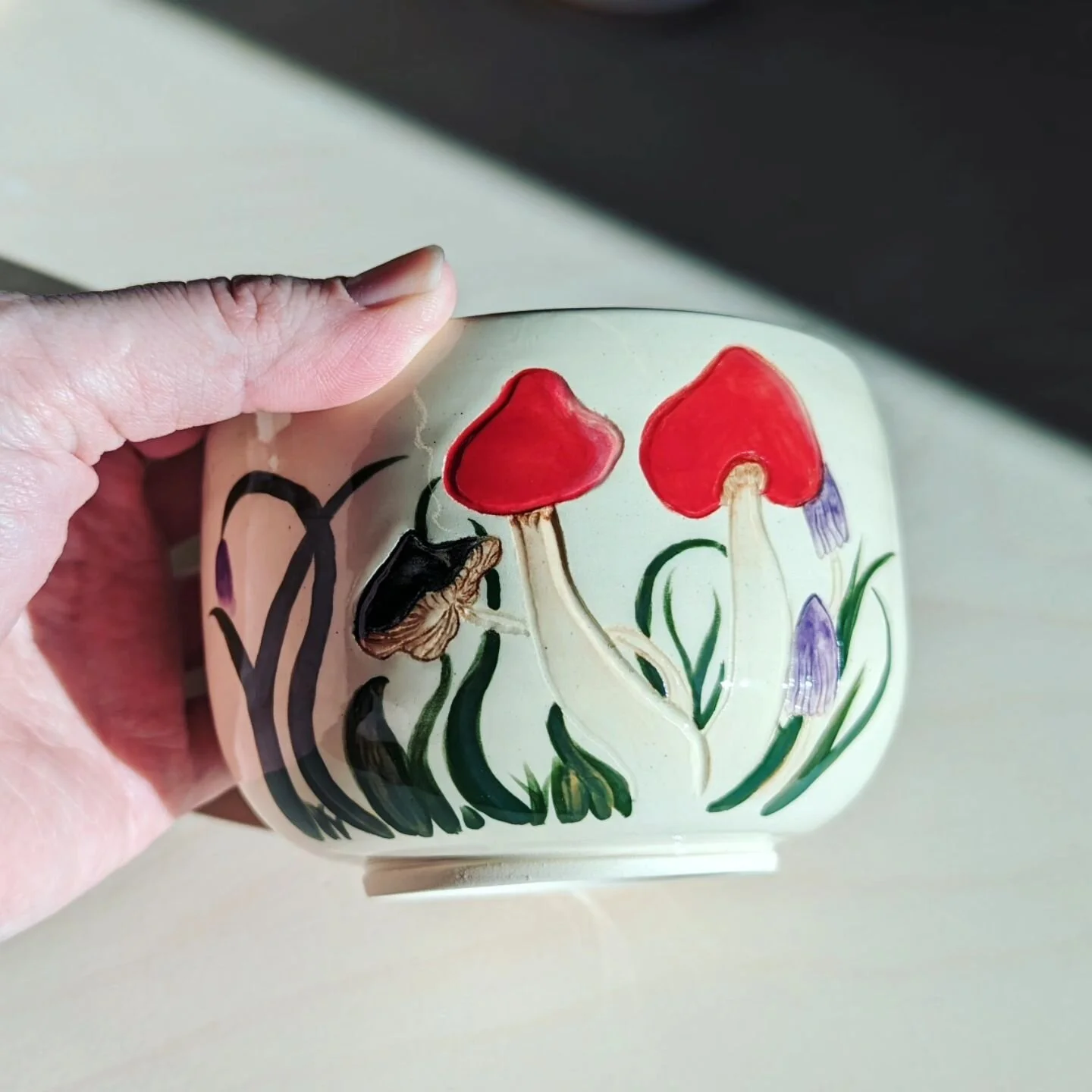 A happy little mushroom bowl 😁
I've been having fun easing back into ceramics and teaching wheel throwing.

Fired to cone 1 with Amaco underglaze and Mayco low fire clear.

#ceramics #ceramicart #pottery #amfa