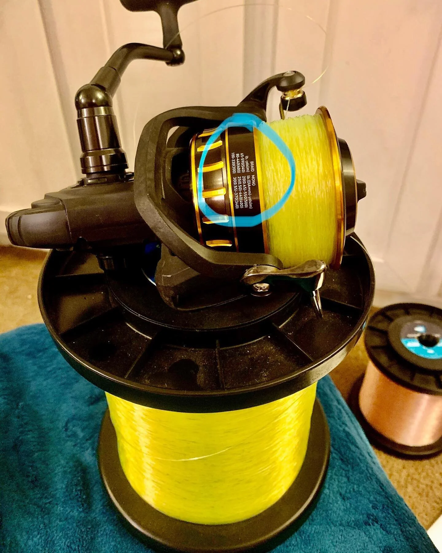 How much fishing line do you need on your Fishing Reel

I get this question a lot on Amazon and Facebook and other social media platforms. How much fishing line do I need to fill my reel? 
Checkout my Dawia BG 8000 in the picture above. I have 30lbs 