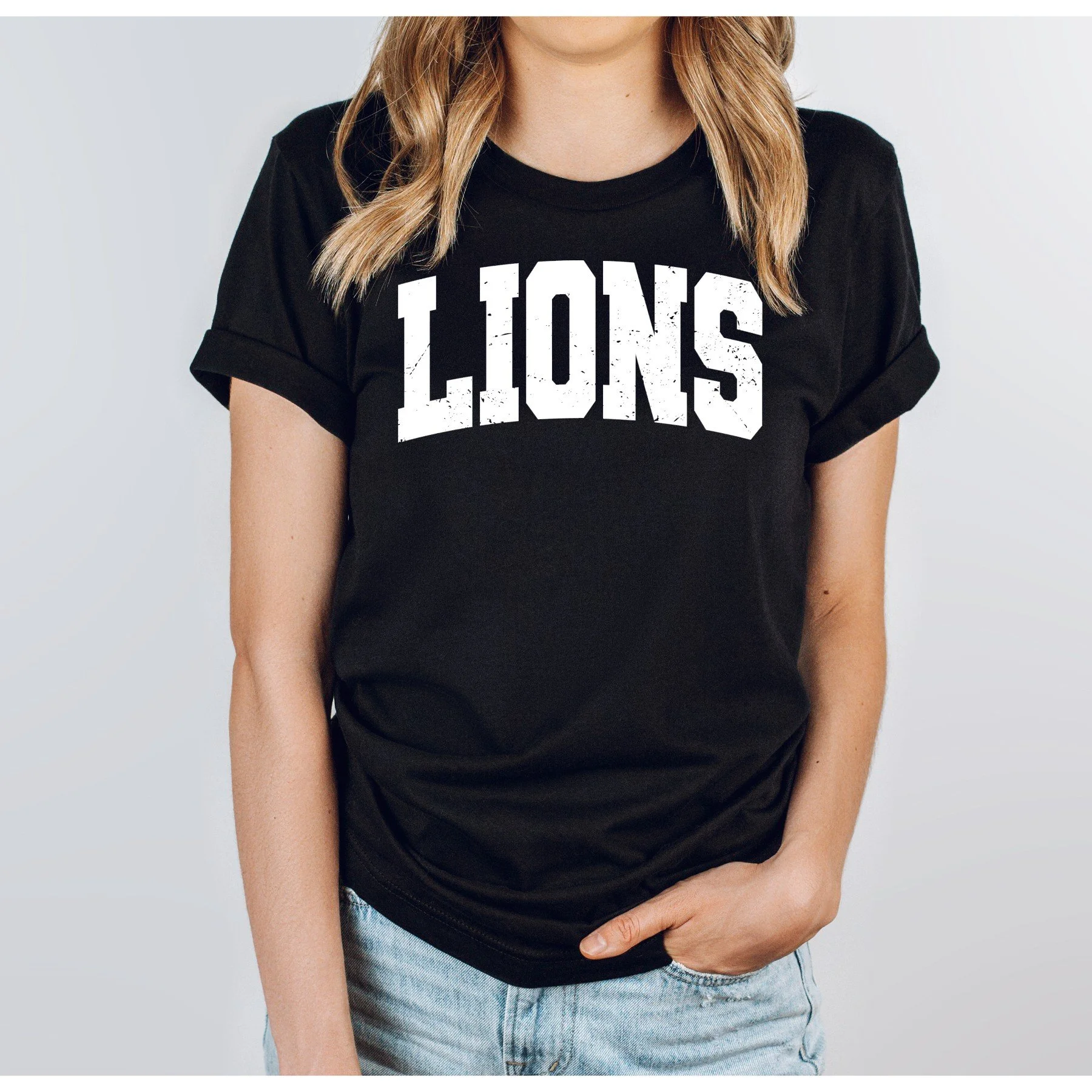 Lions varsity white on black female .jpg