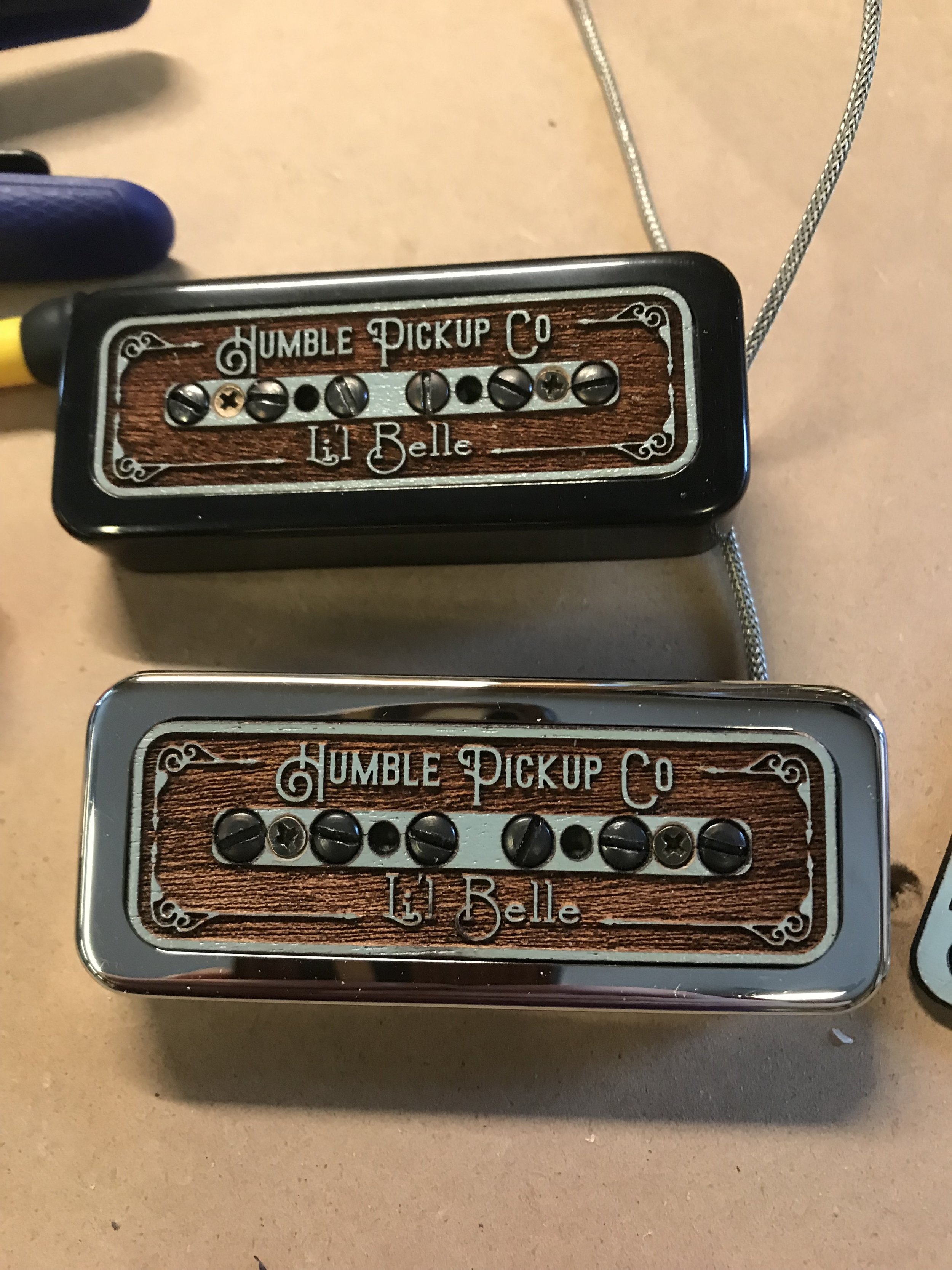  Powder blue on Mahogany with black poles and black frame (top) and Chrome frame (bottom) on the bench for testing 