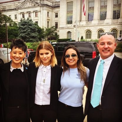 Marty Irby and colleagues with actress Kate Mara on the National Mall at a rally in 2017