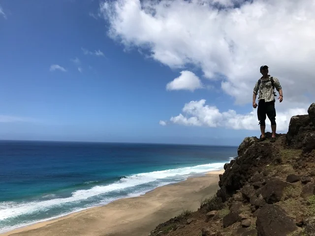 One man near the water in Kauai