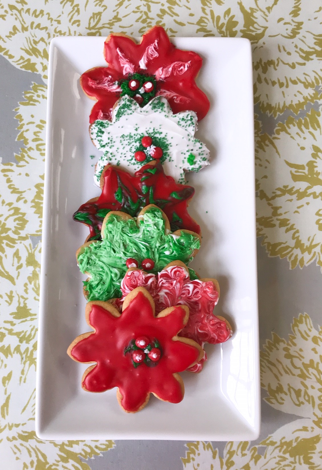 SCW Interiors Life Hacks Blog Post : Poinsettias. A Christmas tradition of mine is to make rolled sugar cookies with my poinsettia cookie cutters. See my favorite recipe from Joy of Cooking.
