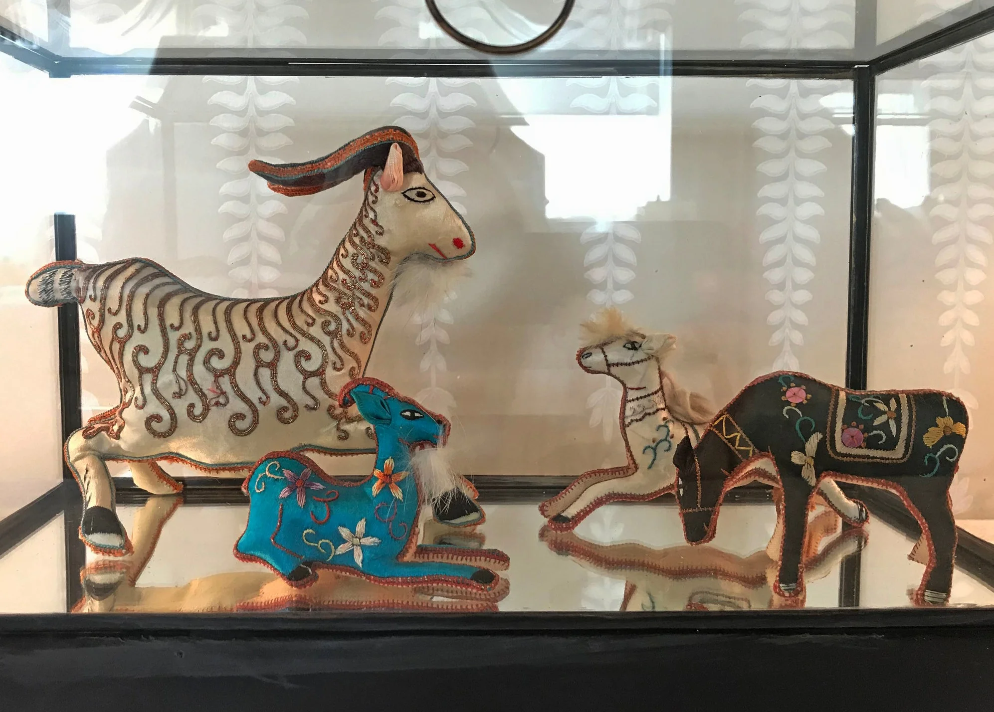 This small collection of antique animal toys resides in my client’s guest bedroom. I found these at a local antique shop and I hope she will hunt for more to add to her collection through the years.