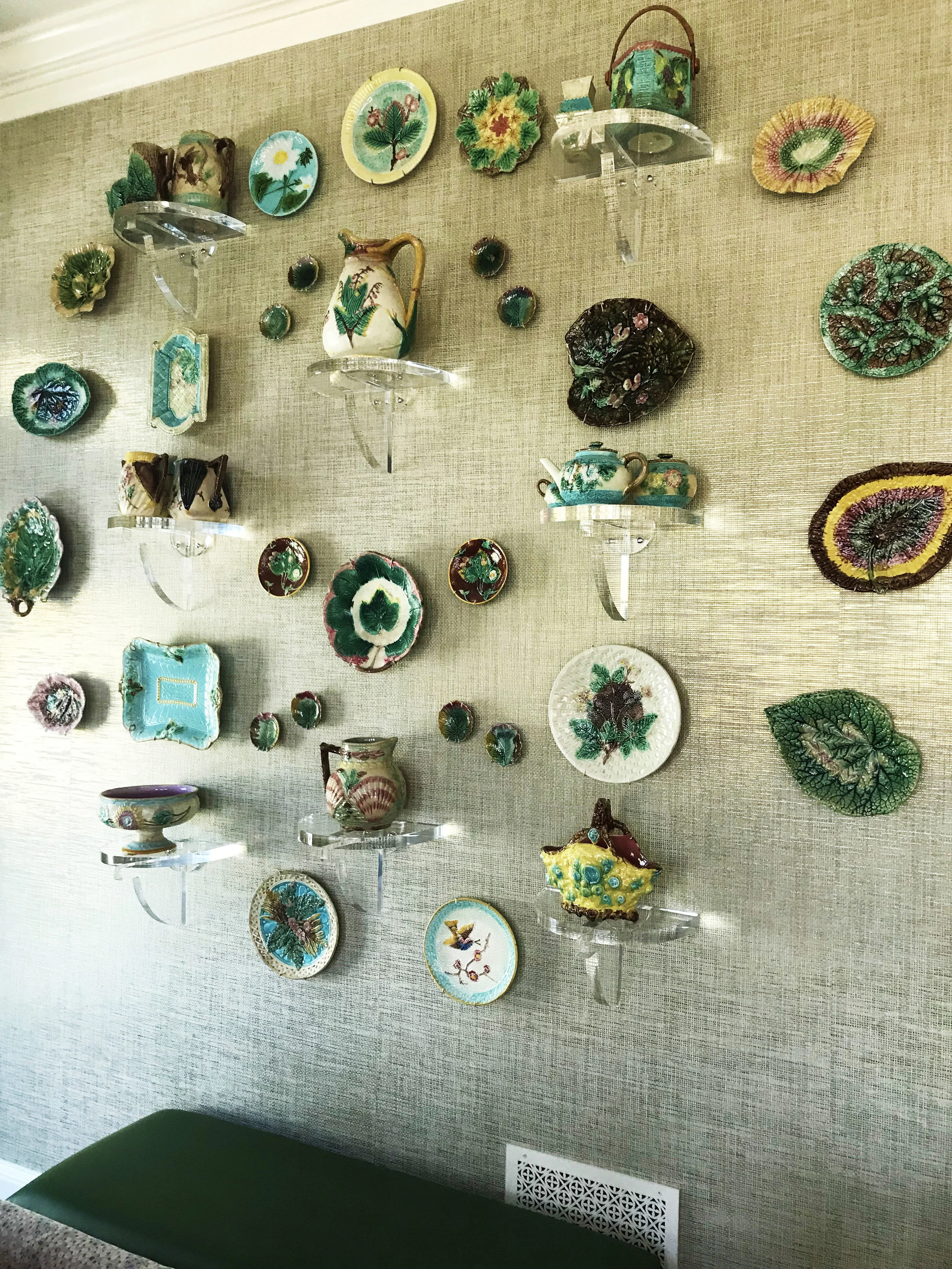 Sometimes my collecting becomes more like hoarding. This collection of majolica found a perfect home in my client’s family room. I love creating dimensional displays on walls that would be next to impossible to fill with artwork. The clear brackets have a modern feel and don’t distract from the color and a symmetry in this composition. This collection was hard to let go of because I am a sucker for pink, green and aqua.