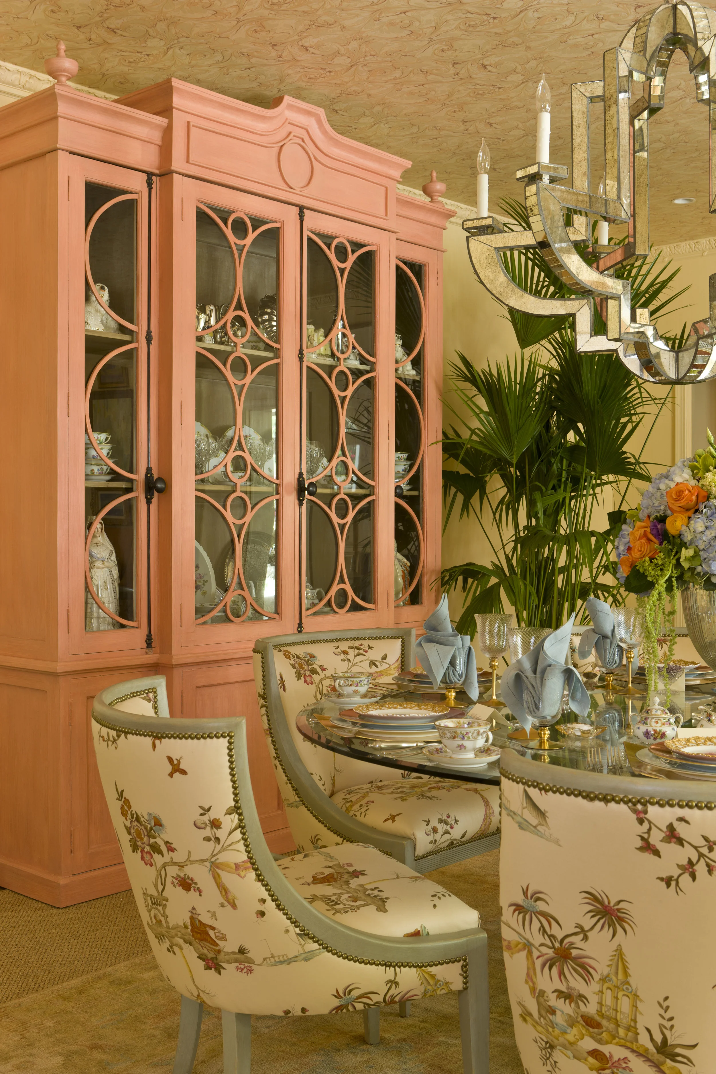 I painted this cabinet coral for a show house dining room to reflect the mood of the space.