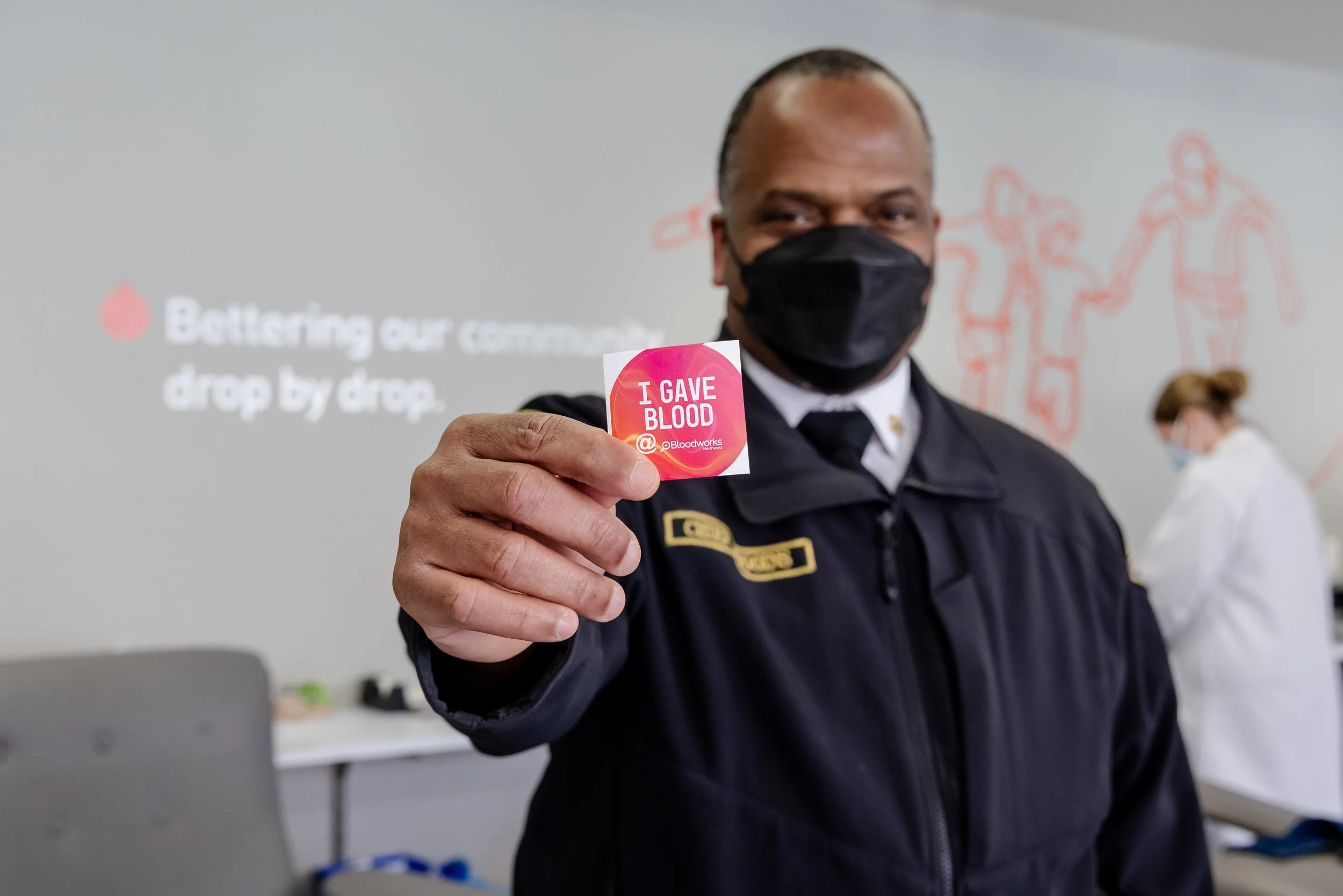  Seattle Fire Department Chief Harold Scoggins donates blood.   