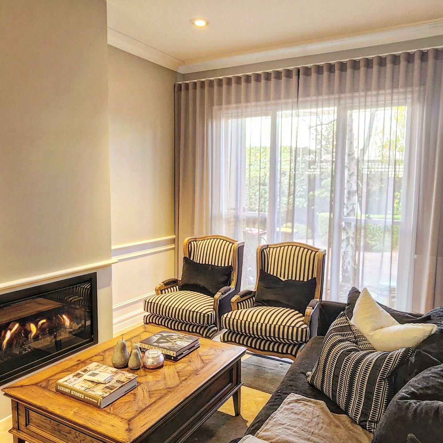 Elevating this luxury space with the perfect touch of elegance&mdash;our newly installed wavefold curtains add a seamless blend of style and sophistication. Their smooth, flowing design complements the classic aesthetic of this home. Functional beaut