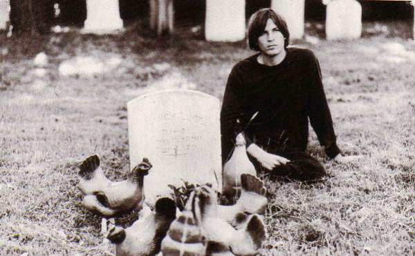 q evan dando at grave with chickens.jpg