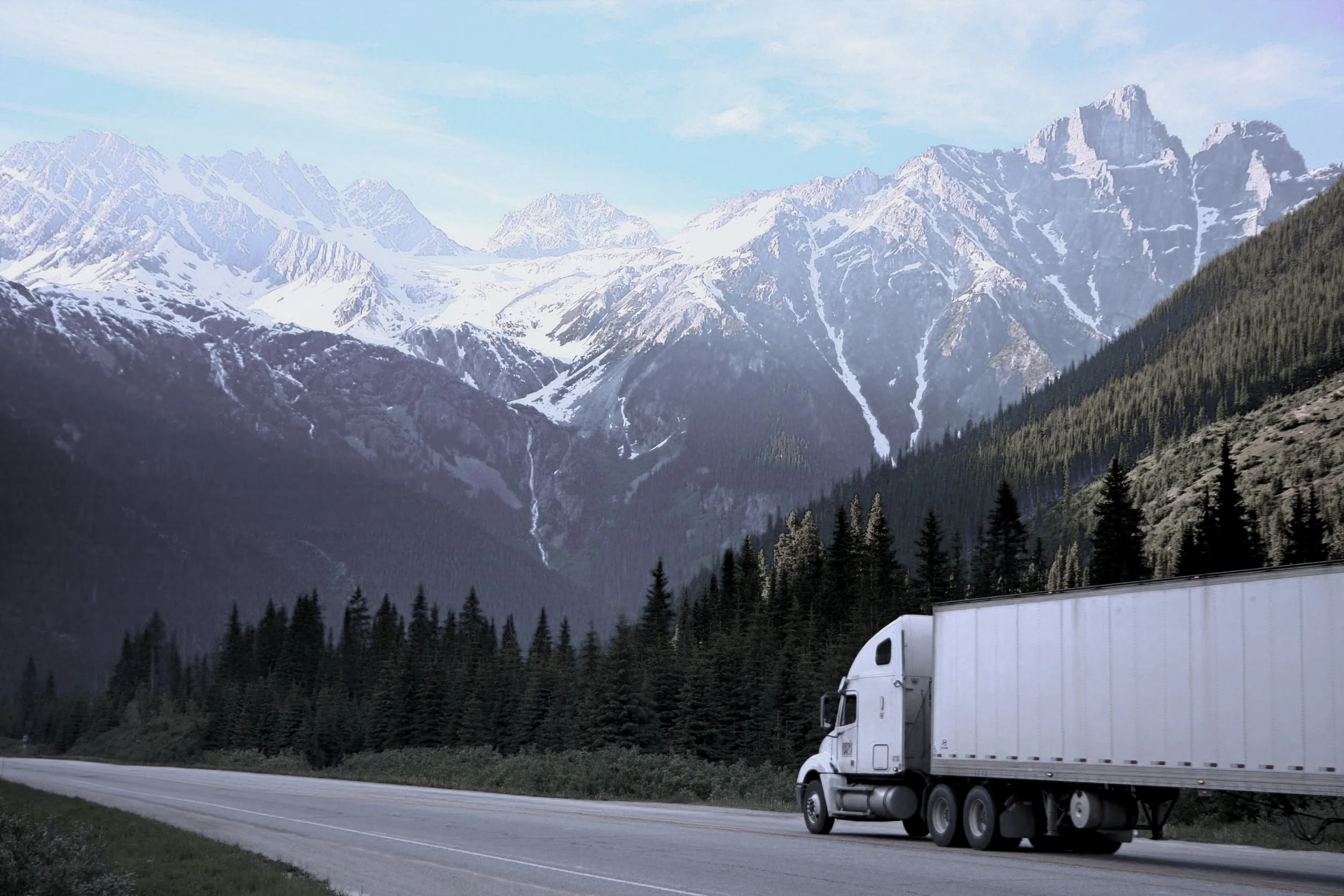 logistics-lorry-mountains-93398.jpg