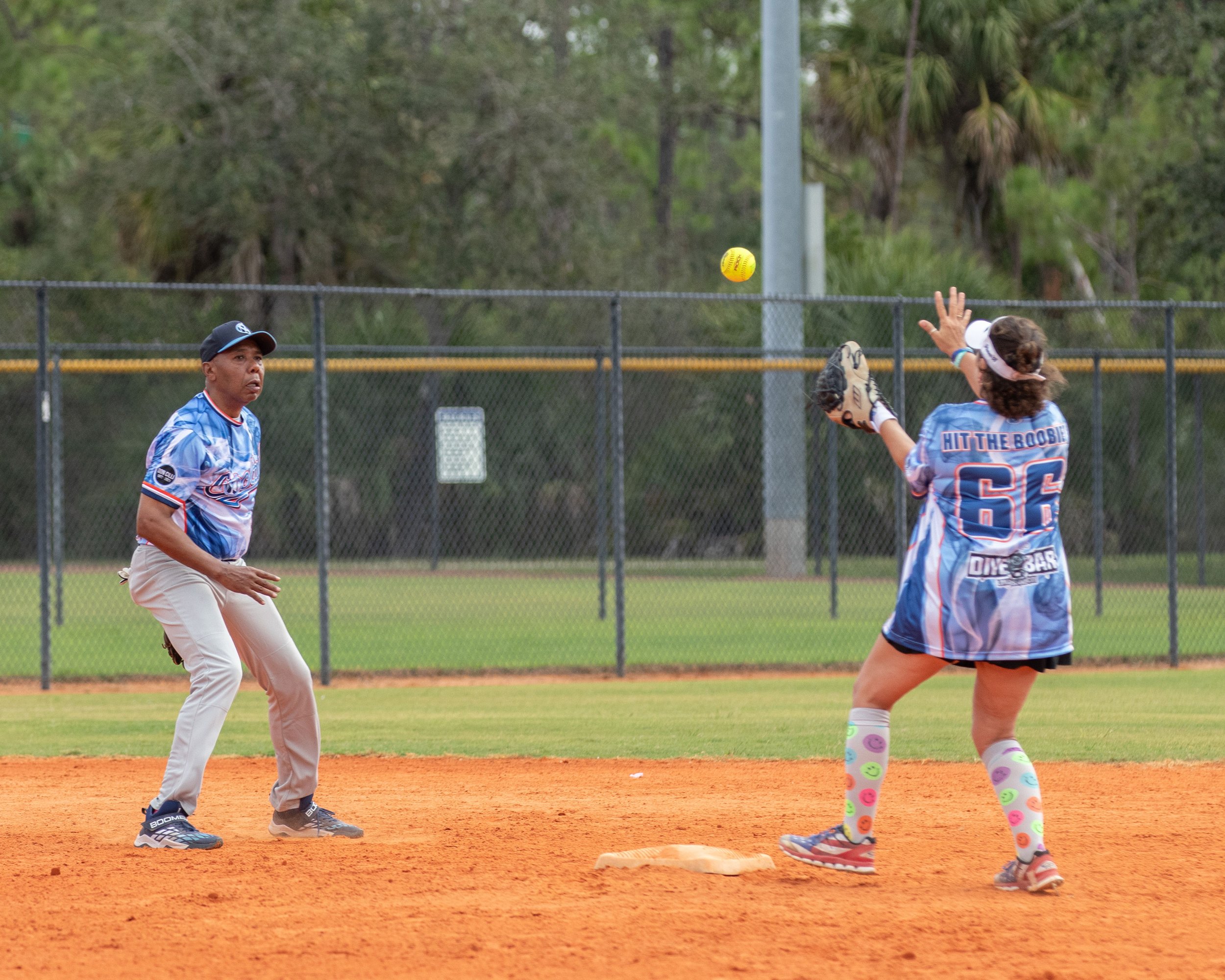 Action - Lou Santos tosses force out to Steph Cilli.JPG