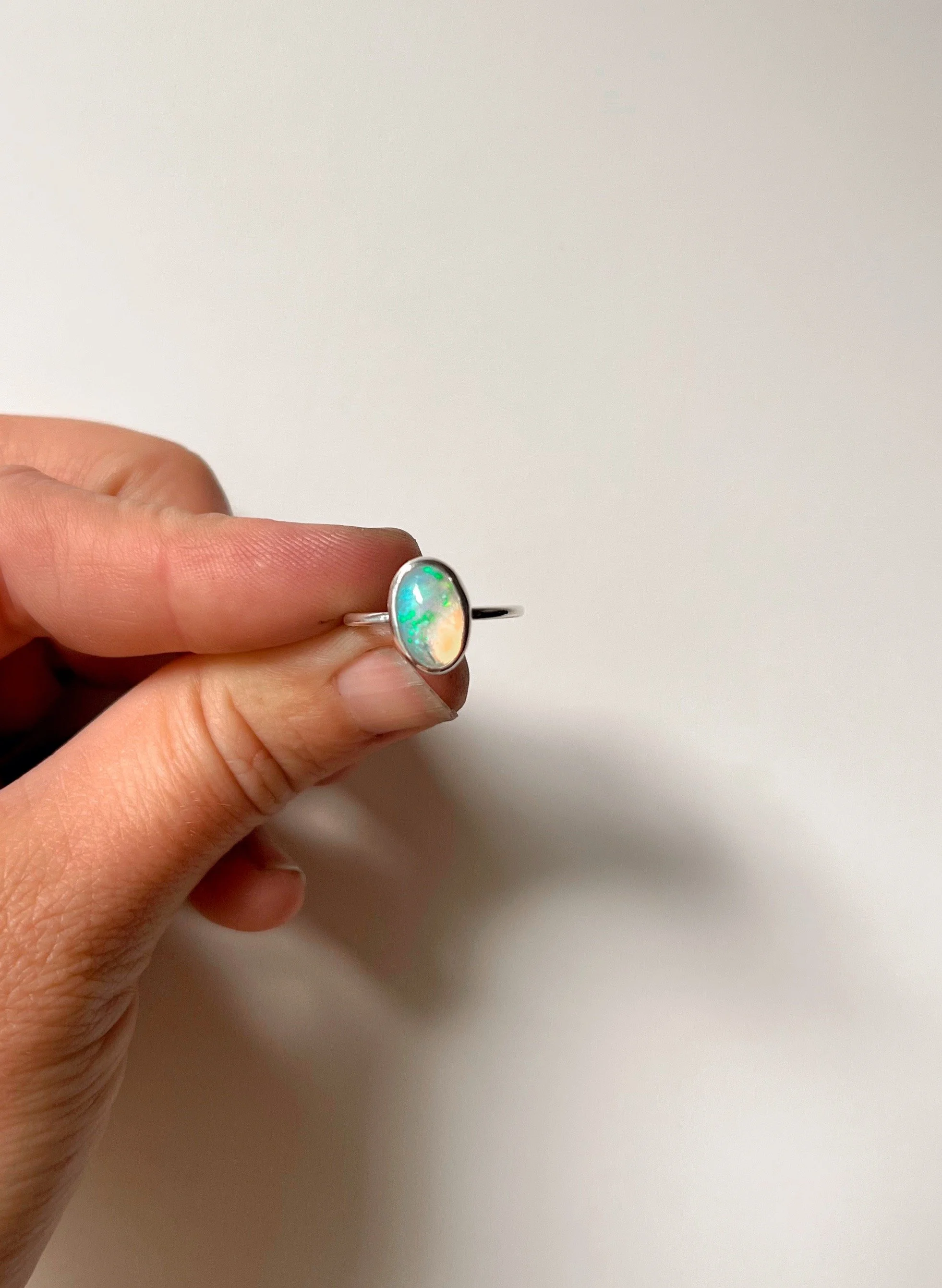 Opal and silver ring