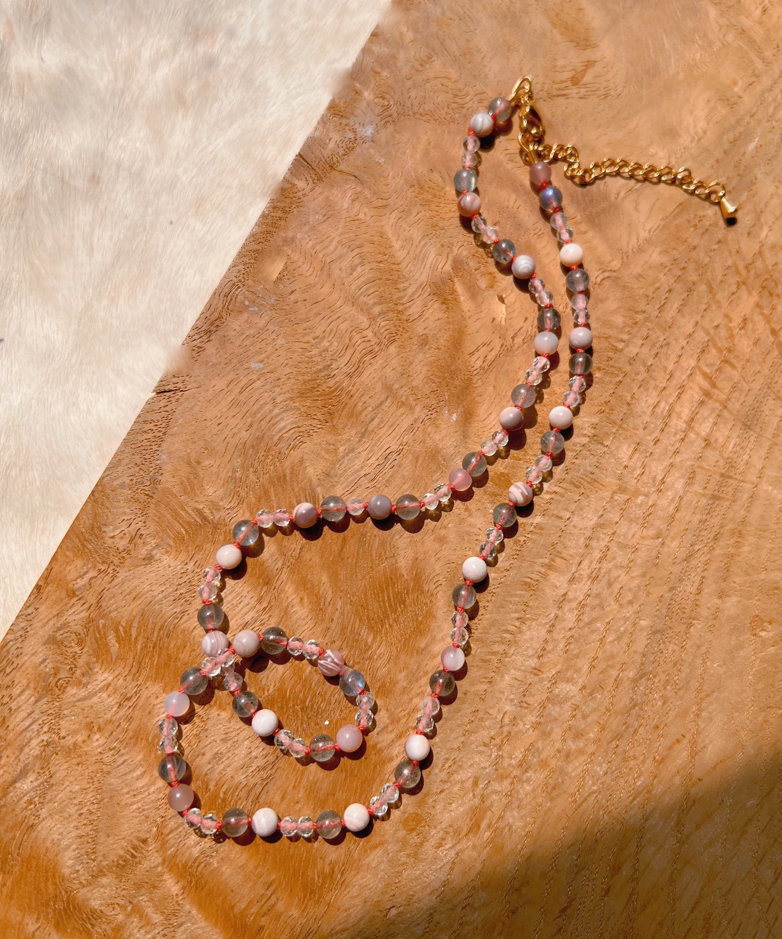 Hand-knotted necklace on pure silk featuring colorful gemstone beads