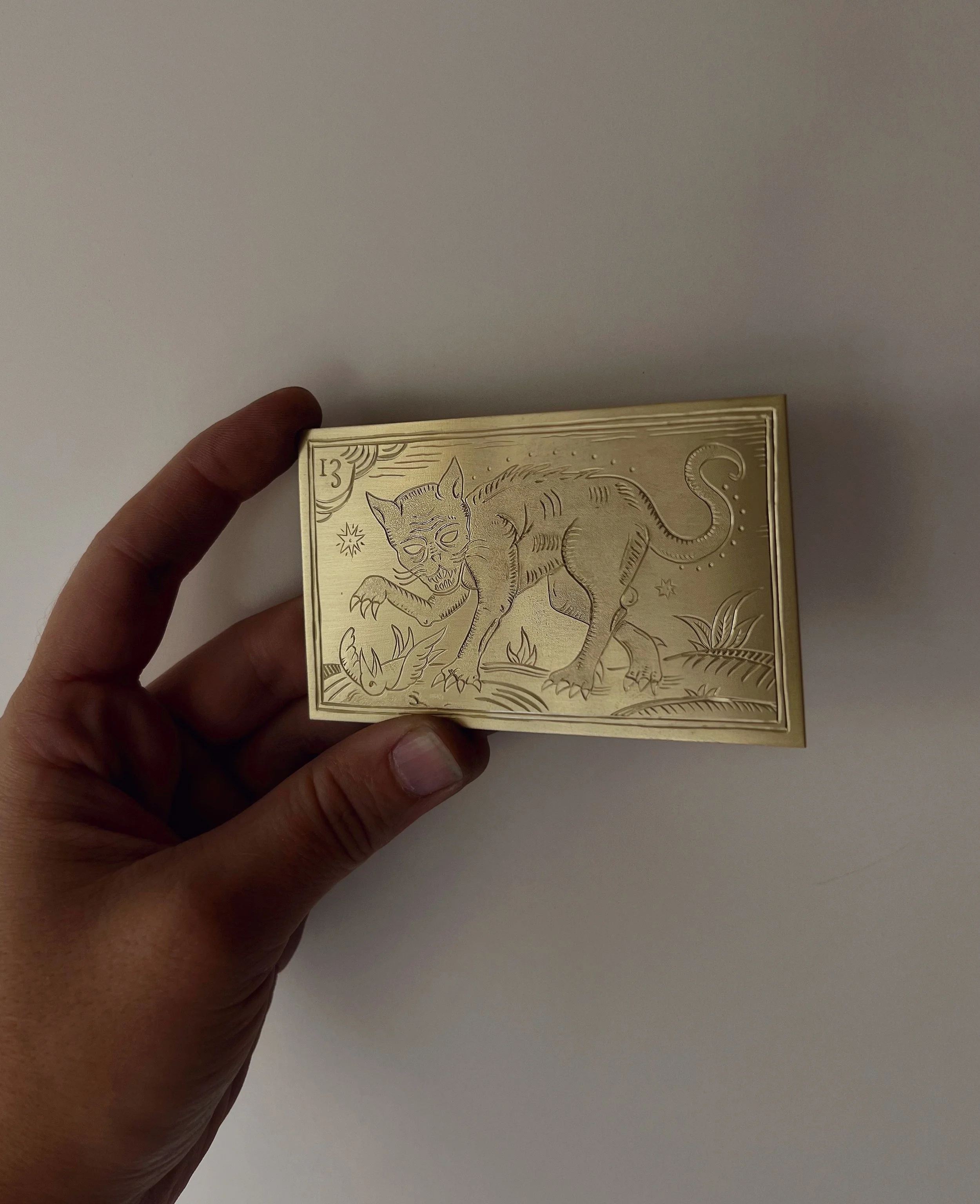 Engraved tarot card