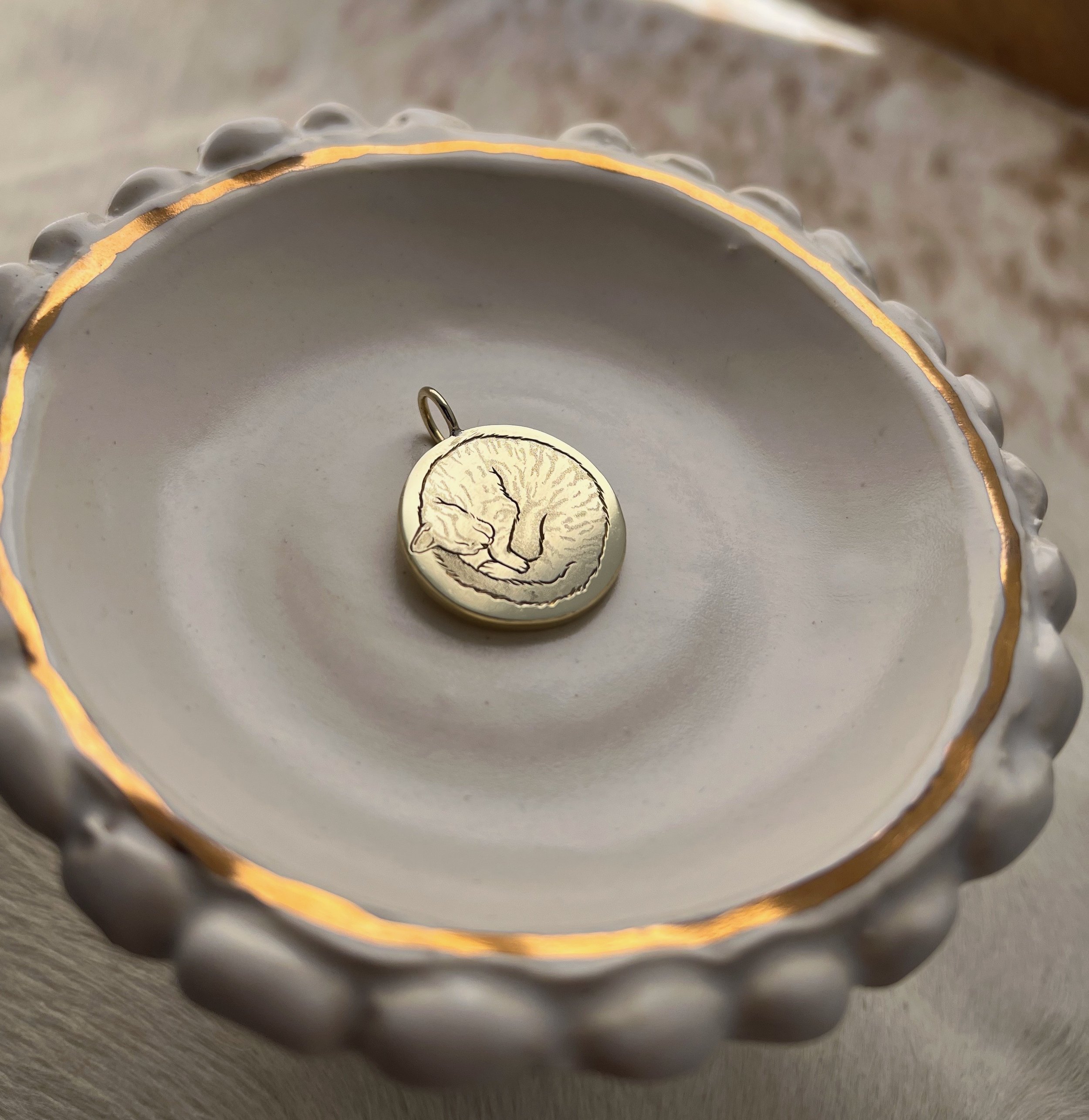 hand engraved cat pendant