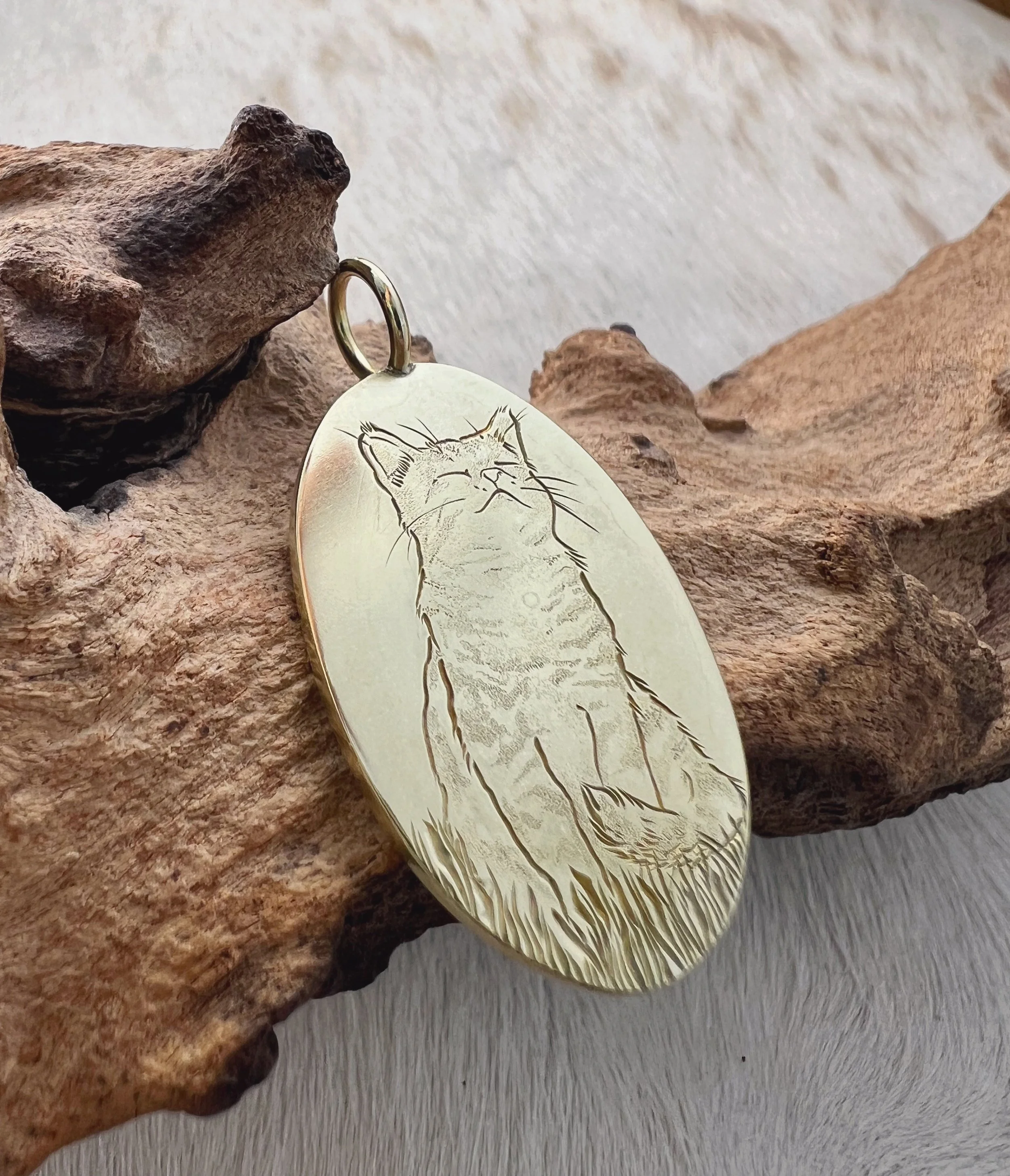 hand engraved cat pendant