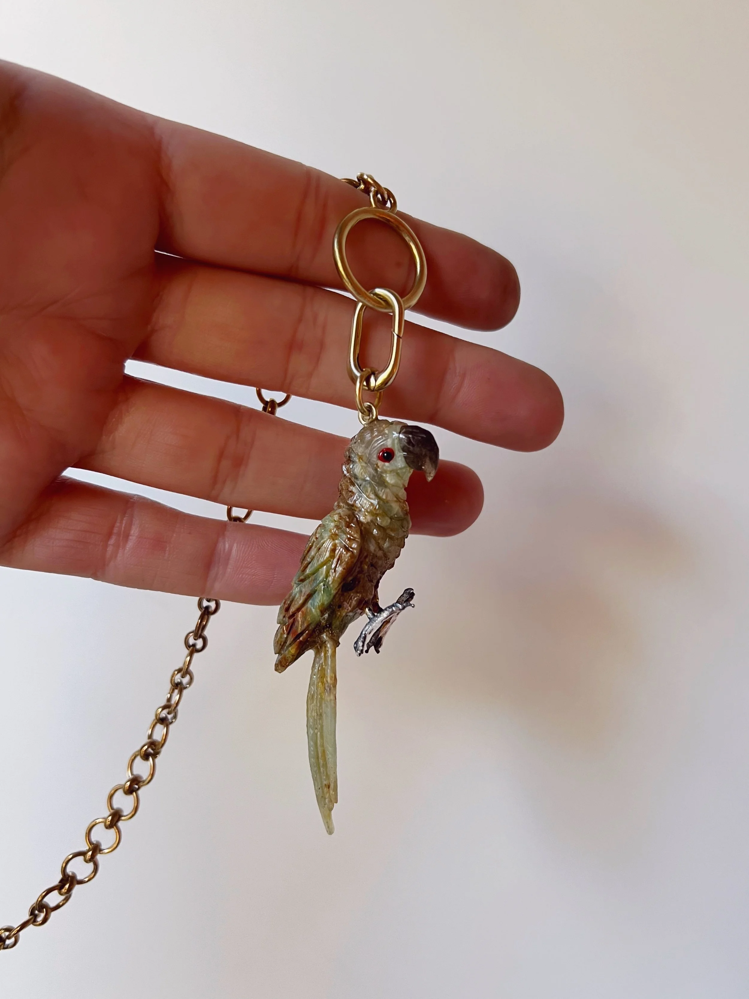 vintage gemstone carved bird pendant
