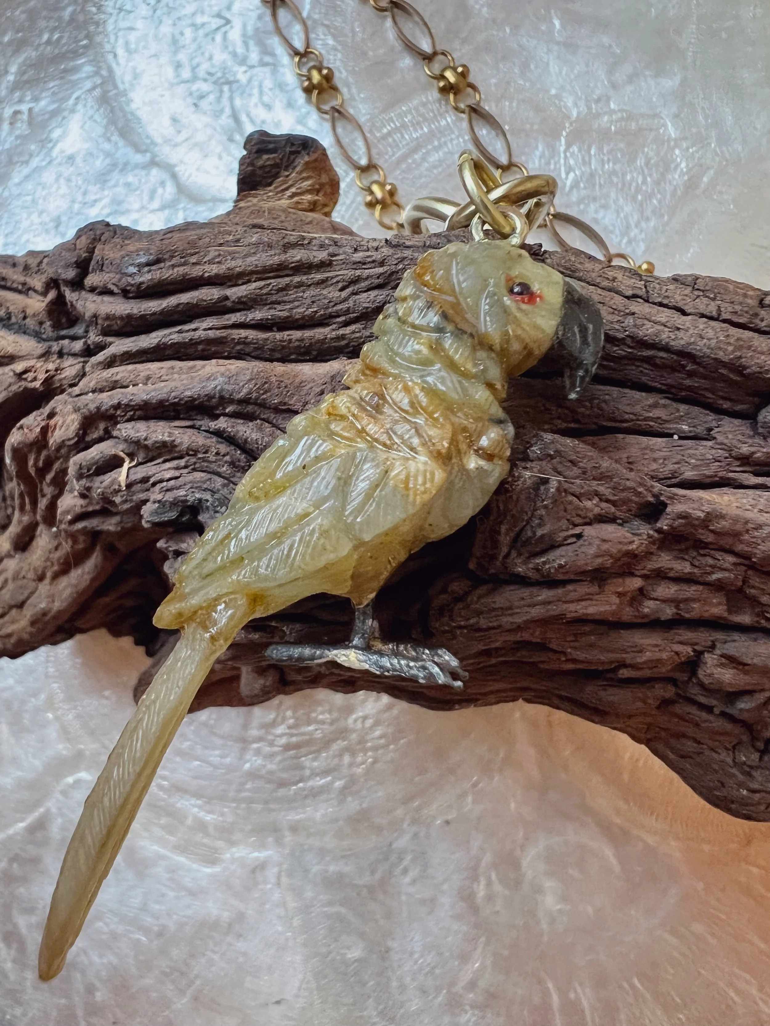 vintage gemstone carved bird pendant