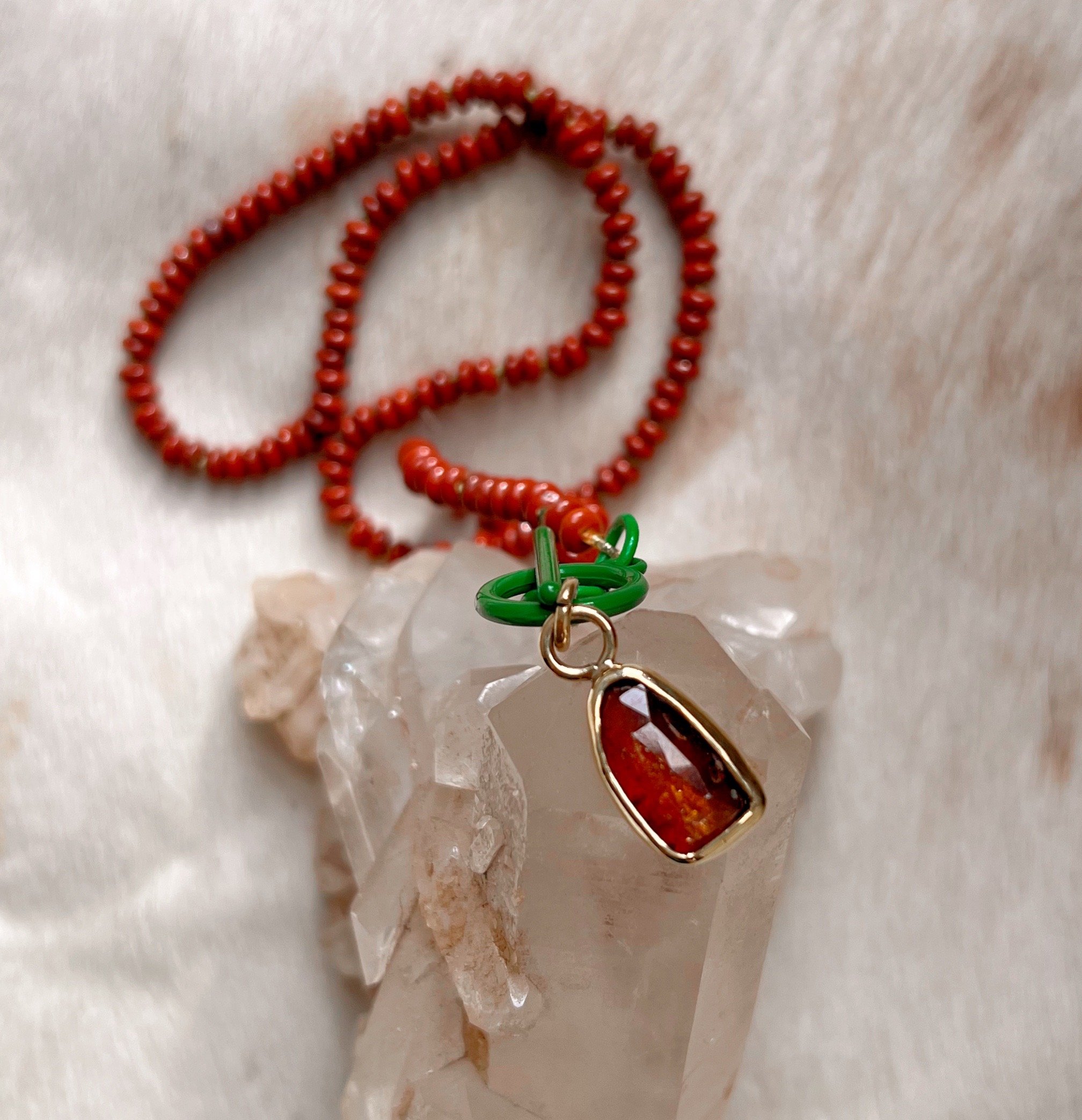 Red jasper candy necklace with an orange kyanite stone
