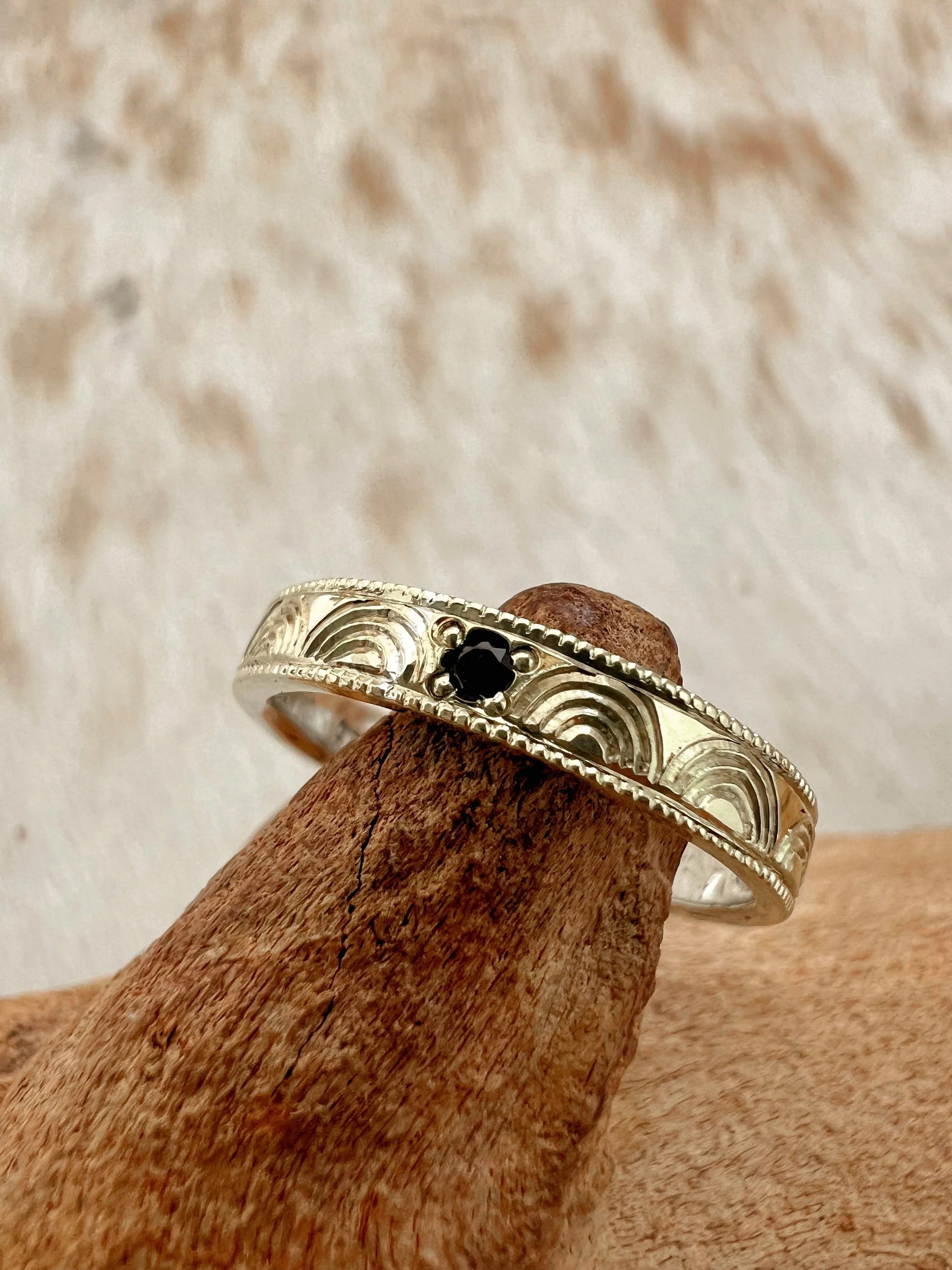 hand engraved ring with onyx stone