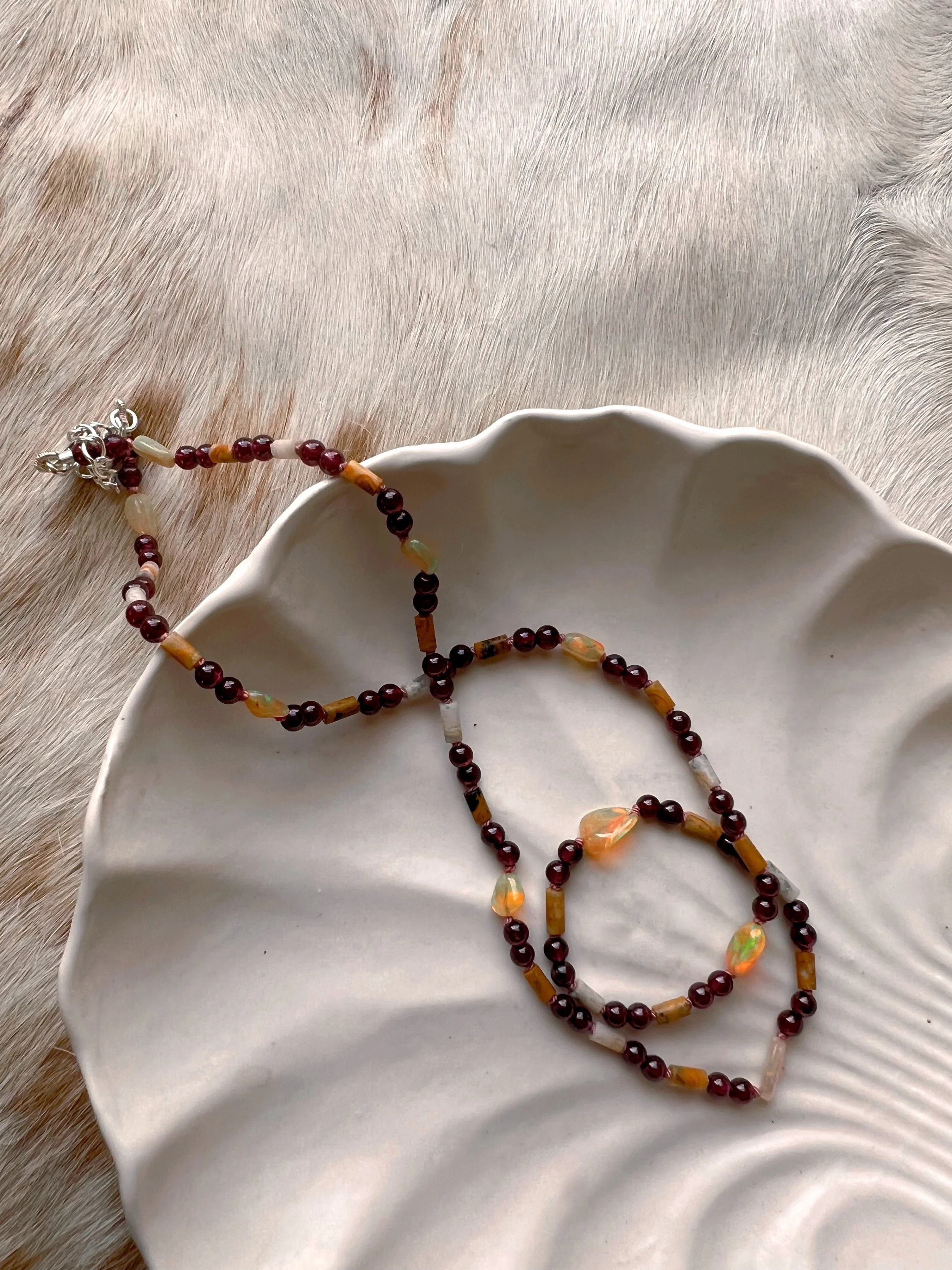 Hand-knotted necklace on pure silk featuring colorful gemstone beads
