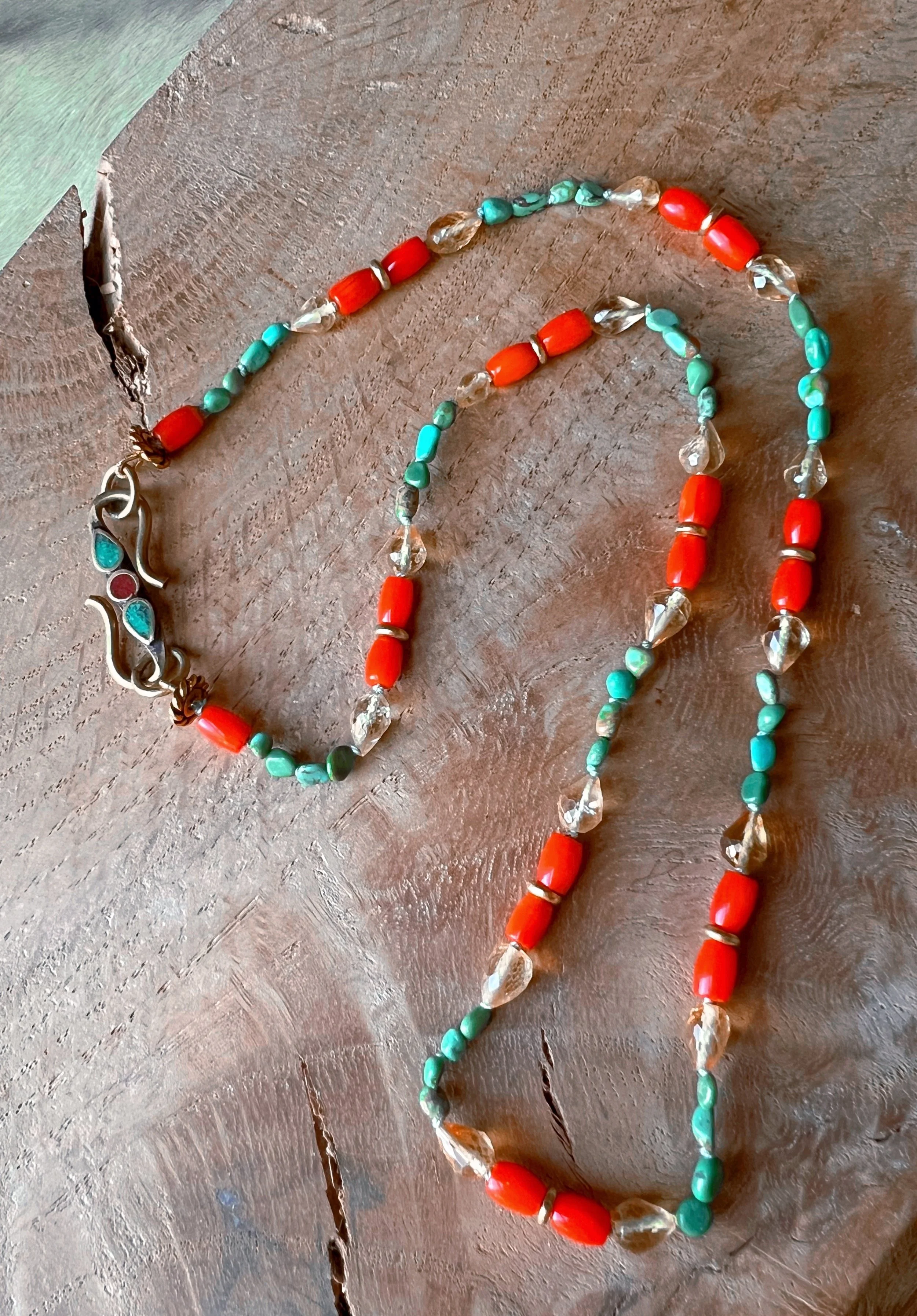 Hand-knotted necklace on pure silk featuring colorful gemstone beads