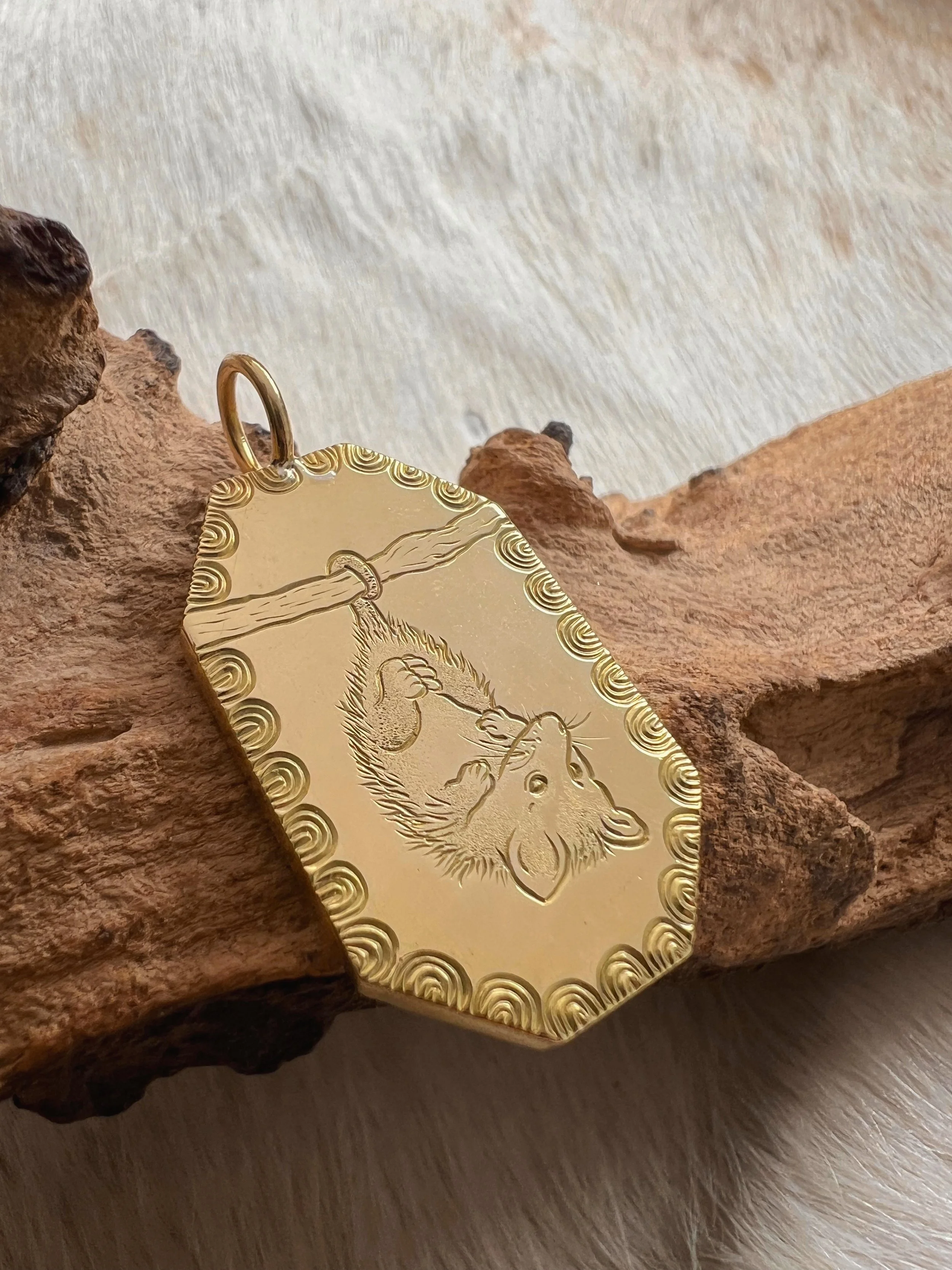 Hand engraved brass Opossum pendant