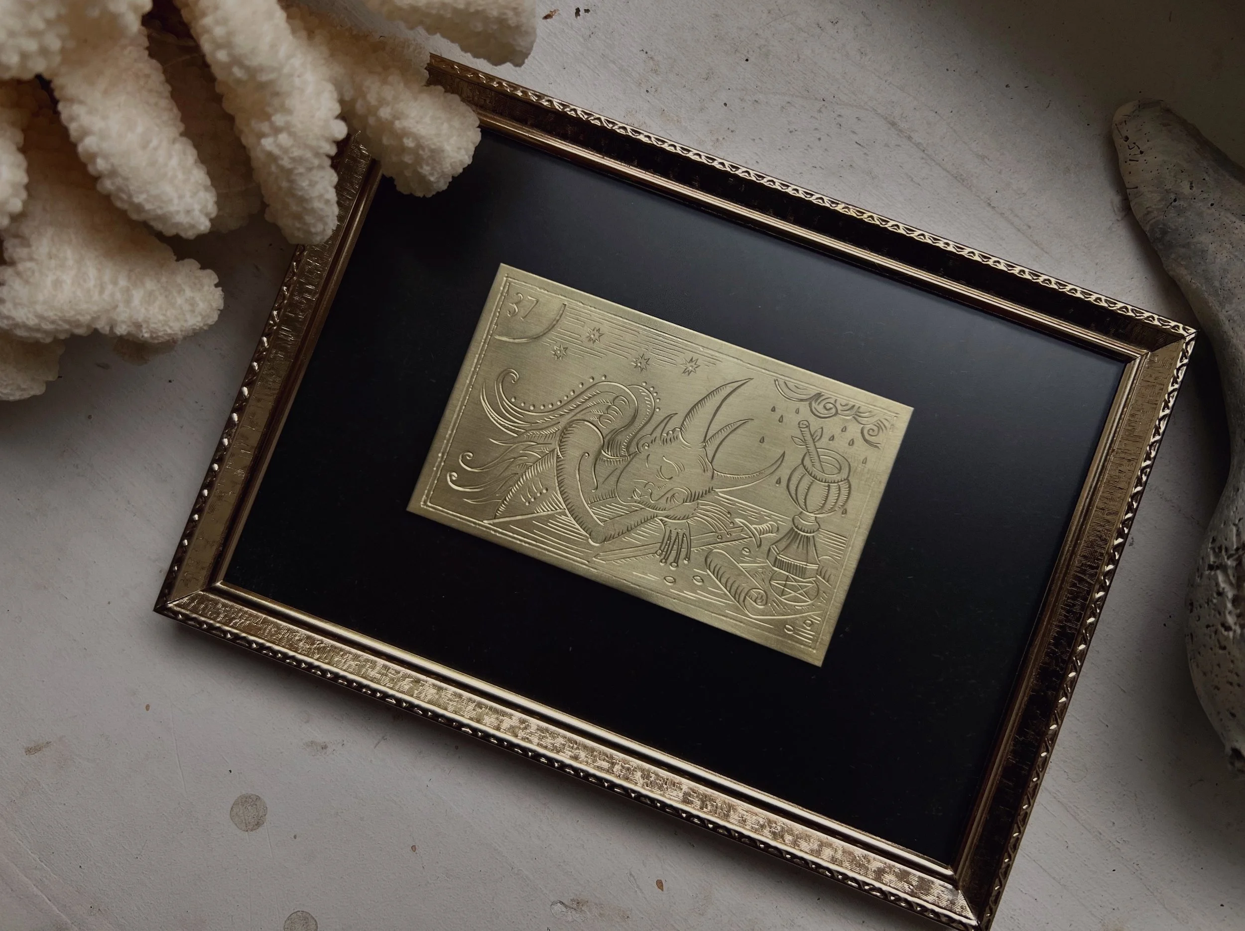 Engraved tarot card