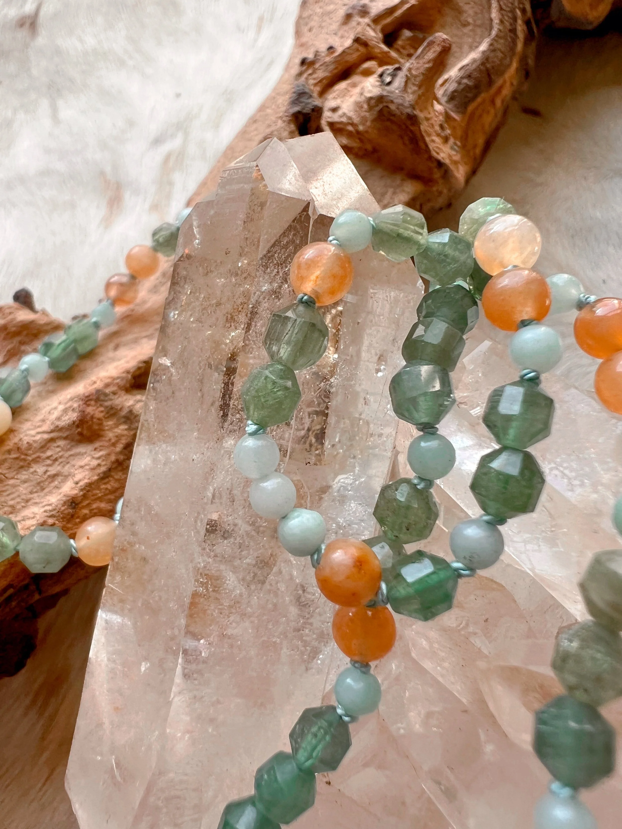 Hand-knotted necklace on pure silk featuring colorful gemstone beads