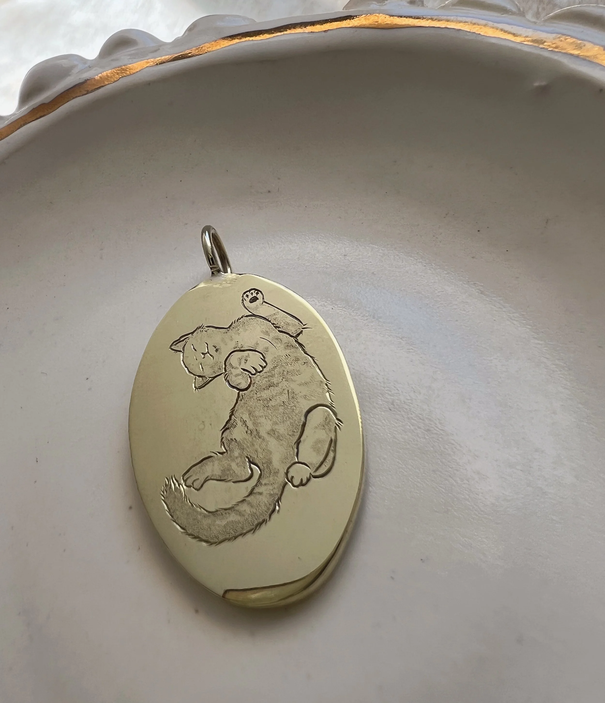 hand engraved cat pendant