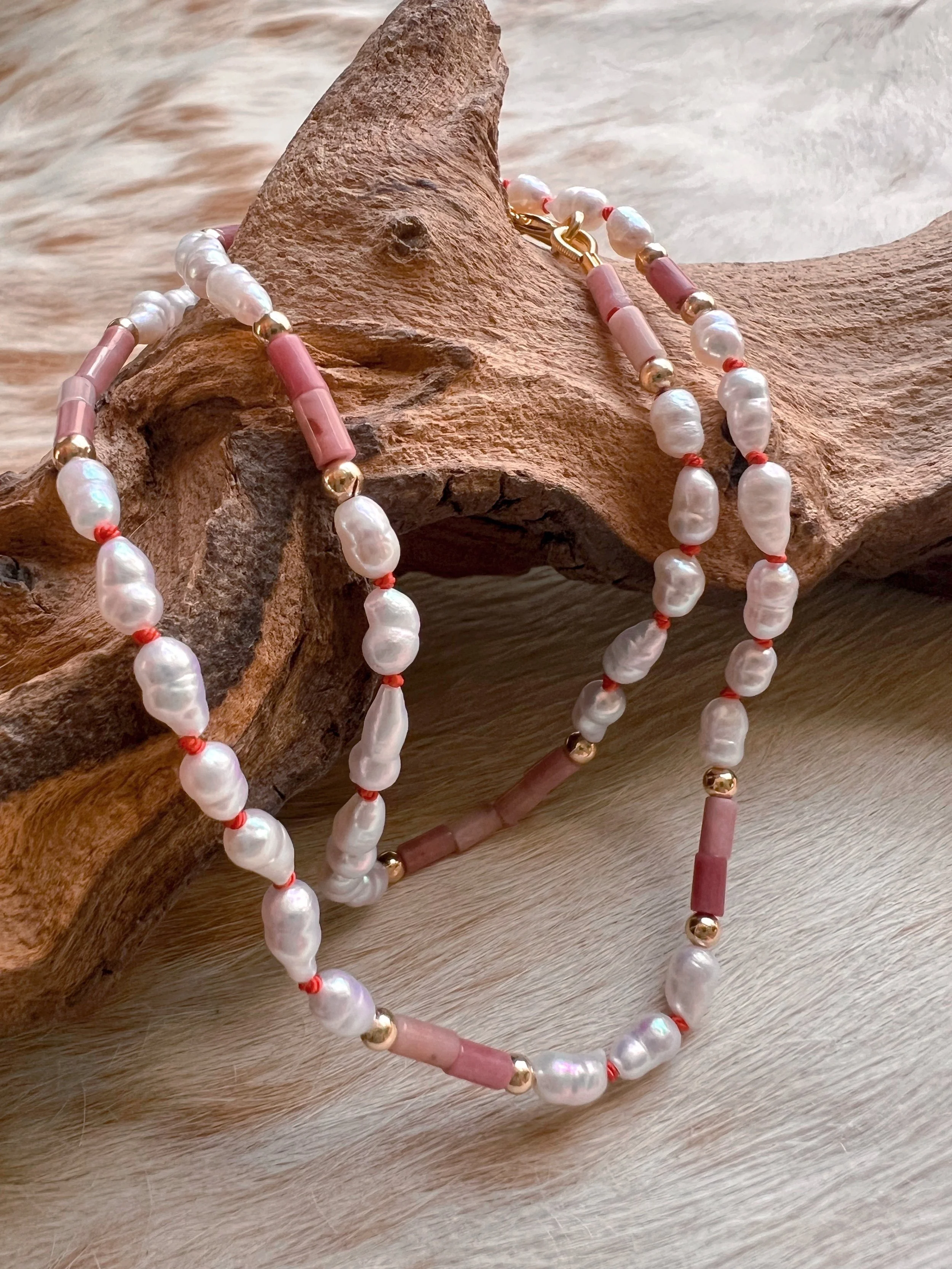 Hand-knotted necklace on pure silk featuring colorful gemstone beads