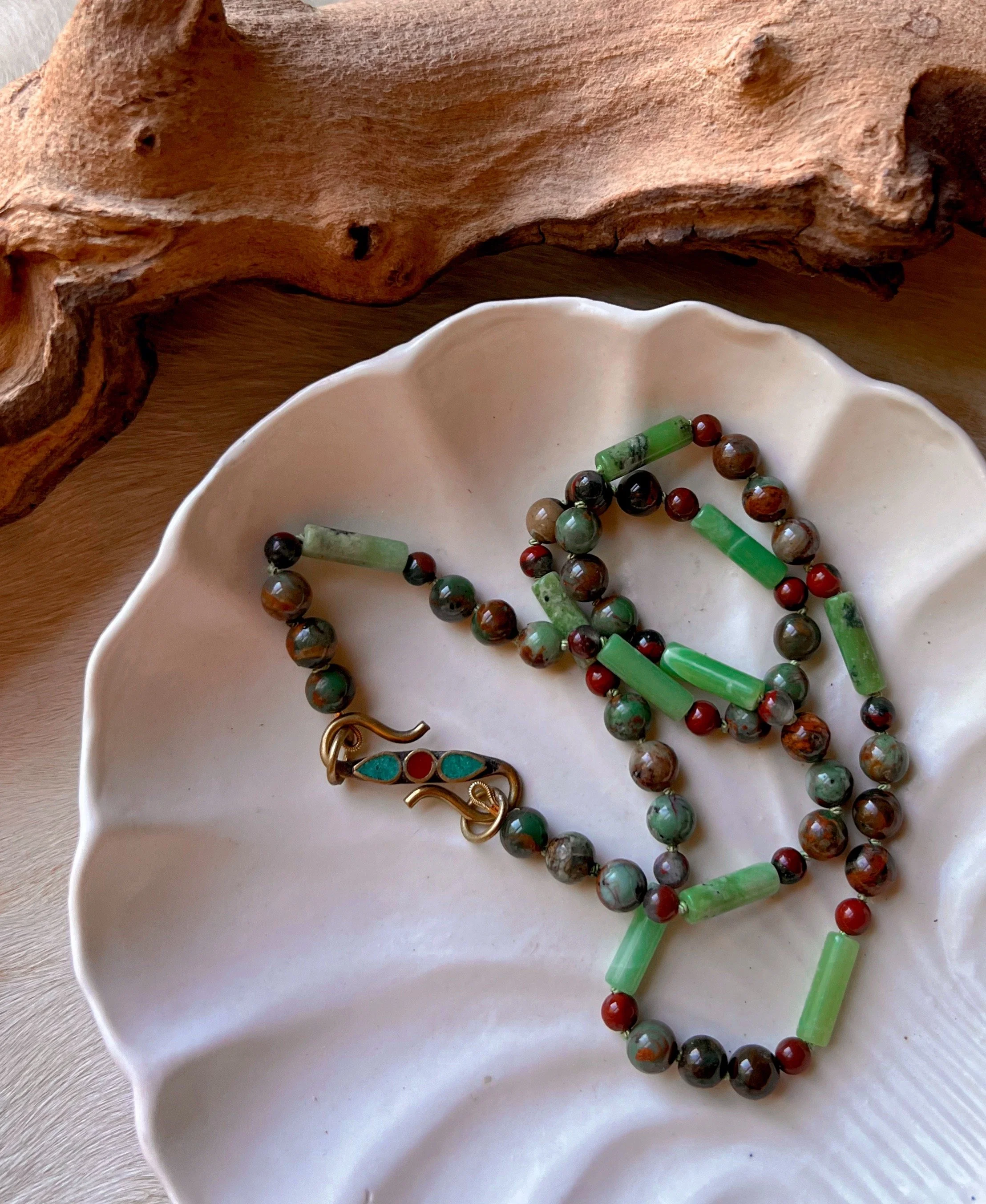 Hand-knotted necklace on pure silk featuring colorful gemstone beads