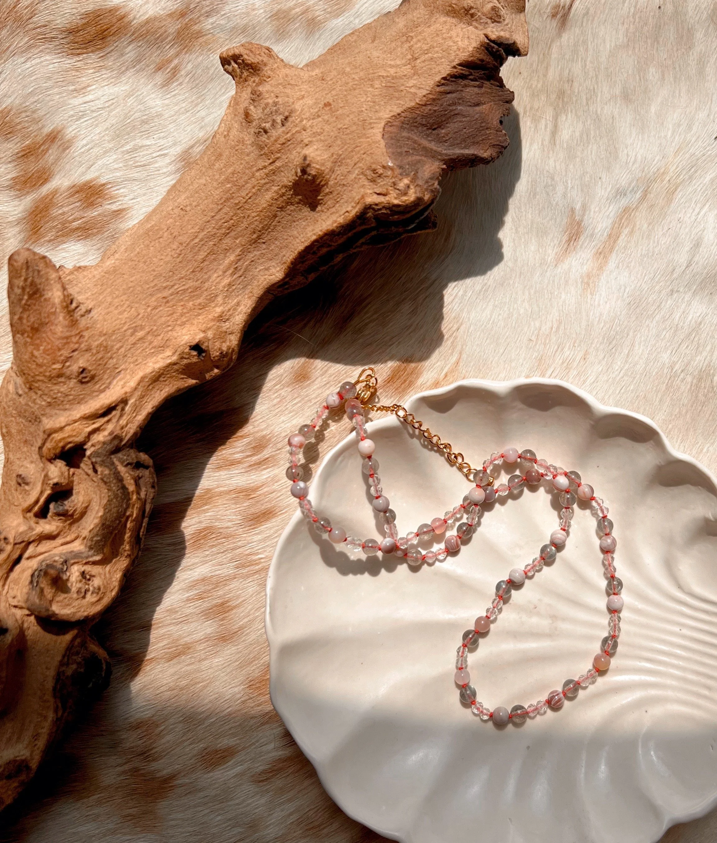 Hand-knotted necklace on pure silk featuring colorful gemstone beads