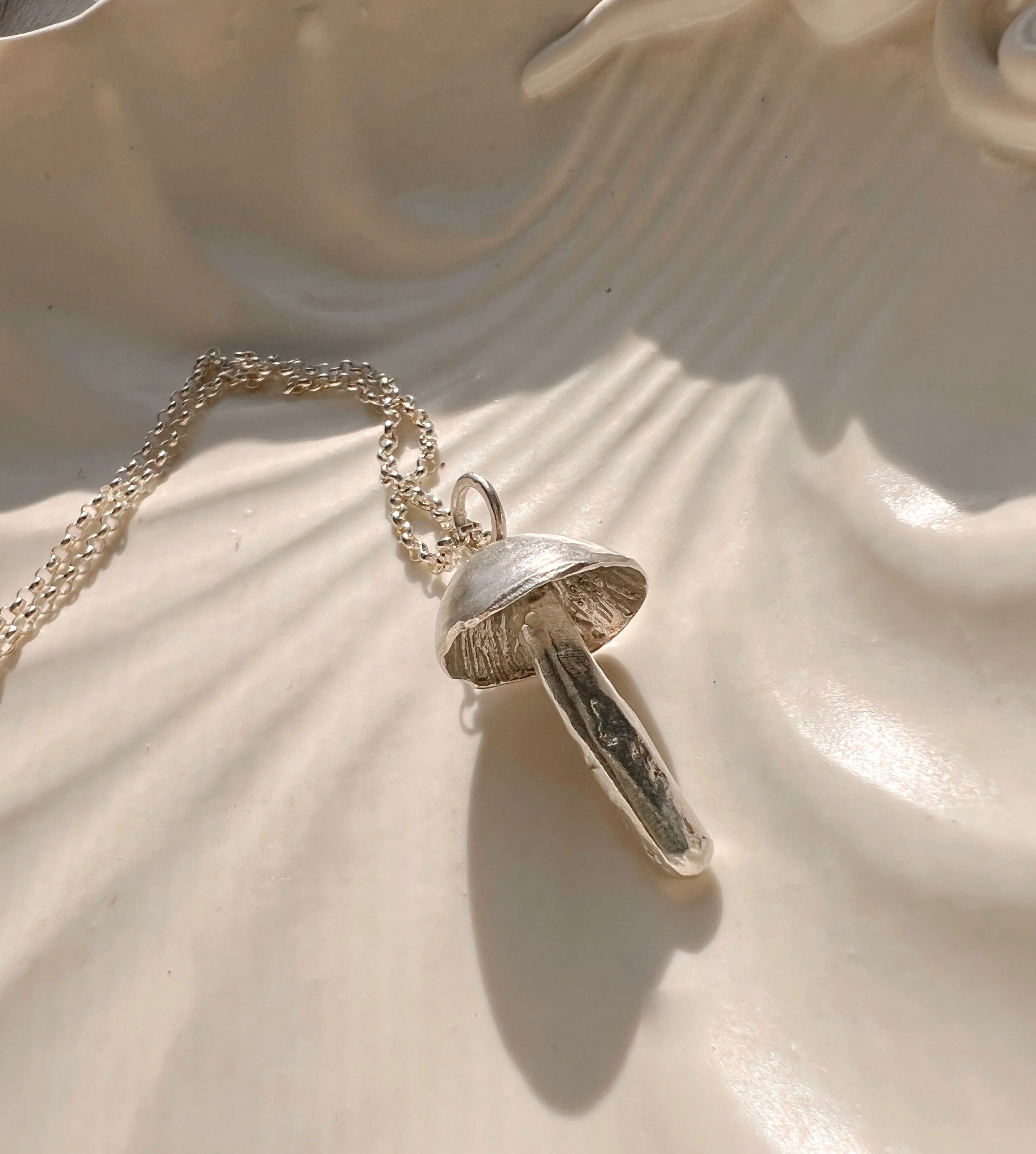 using recycled sterling silver to create a wild mushroom pendant