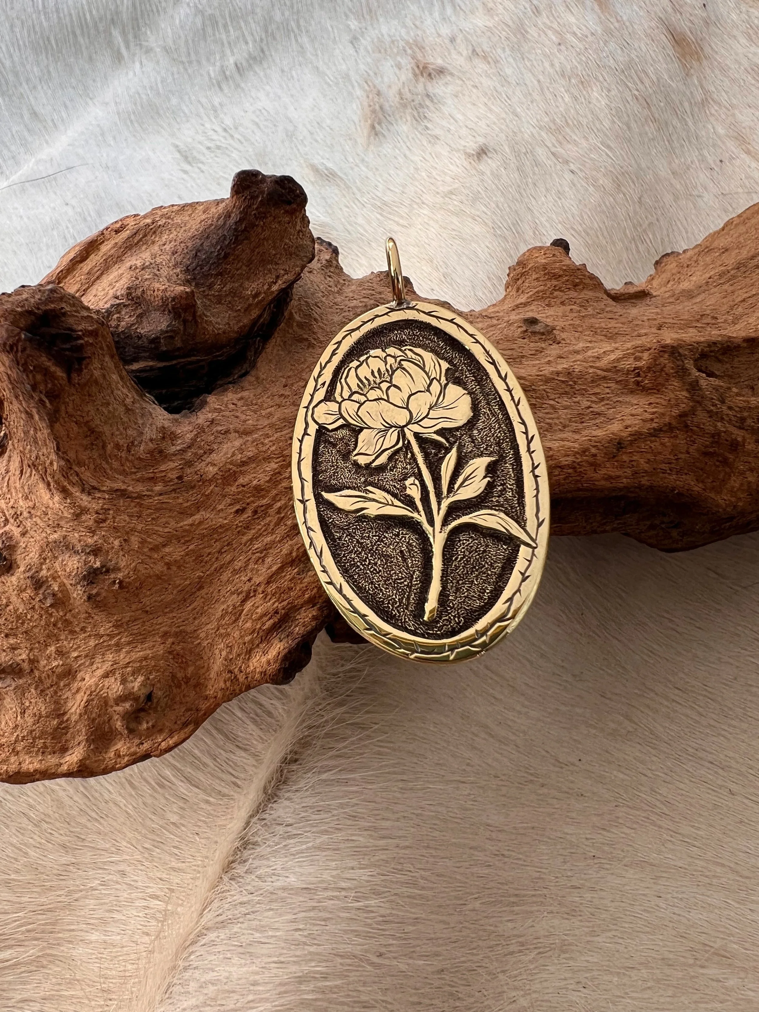 Band engraved, brass pendant featuring peony flower