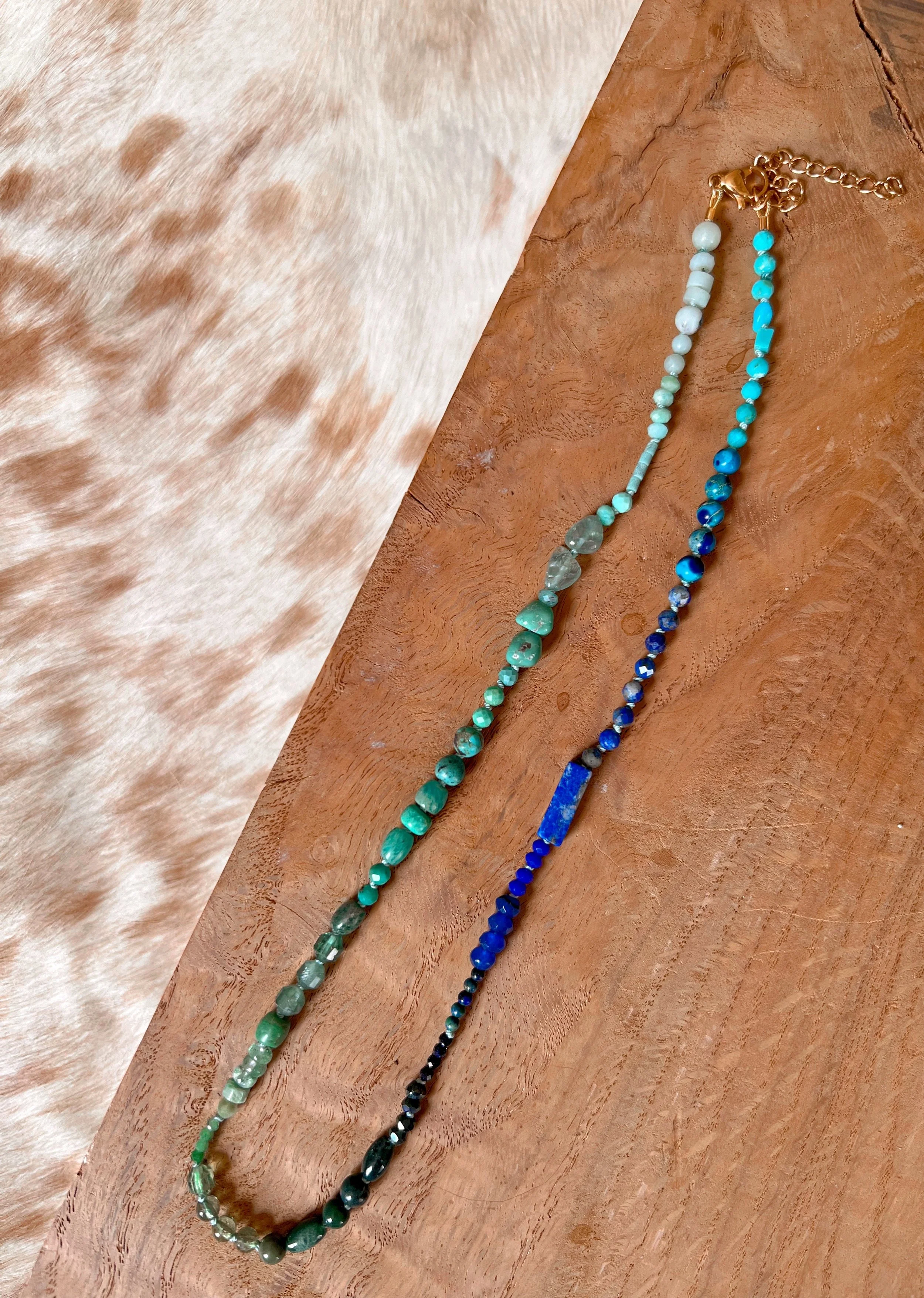 Hand-knotted necklace on pure silk featuring colorful gemstone beads