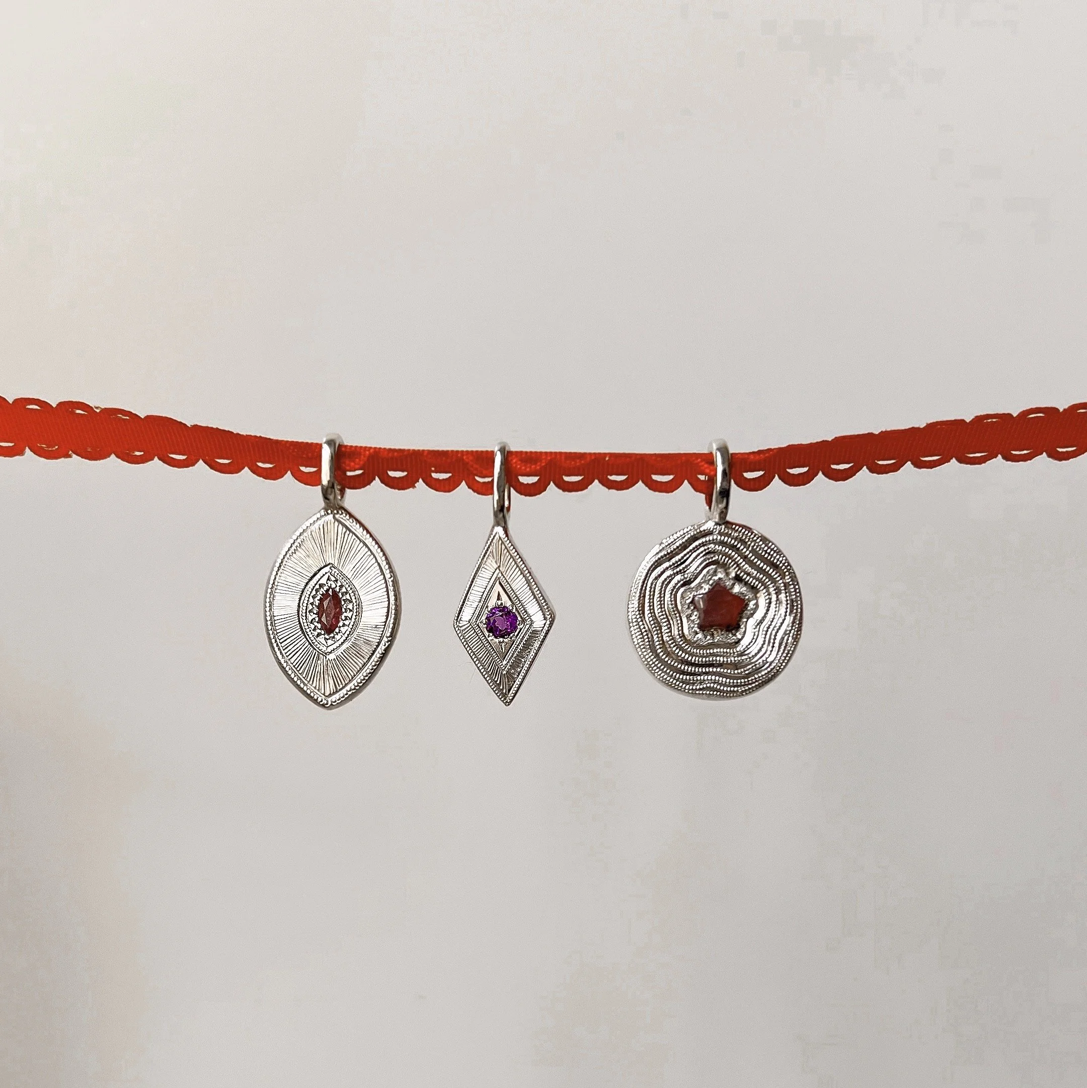 Silver and Ruby hand, engraved pendant (Copy)
