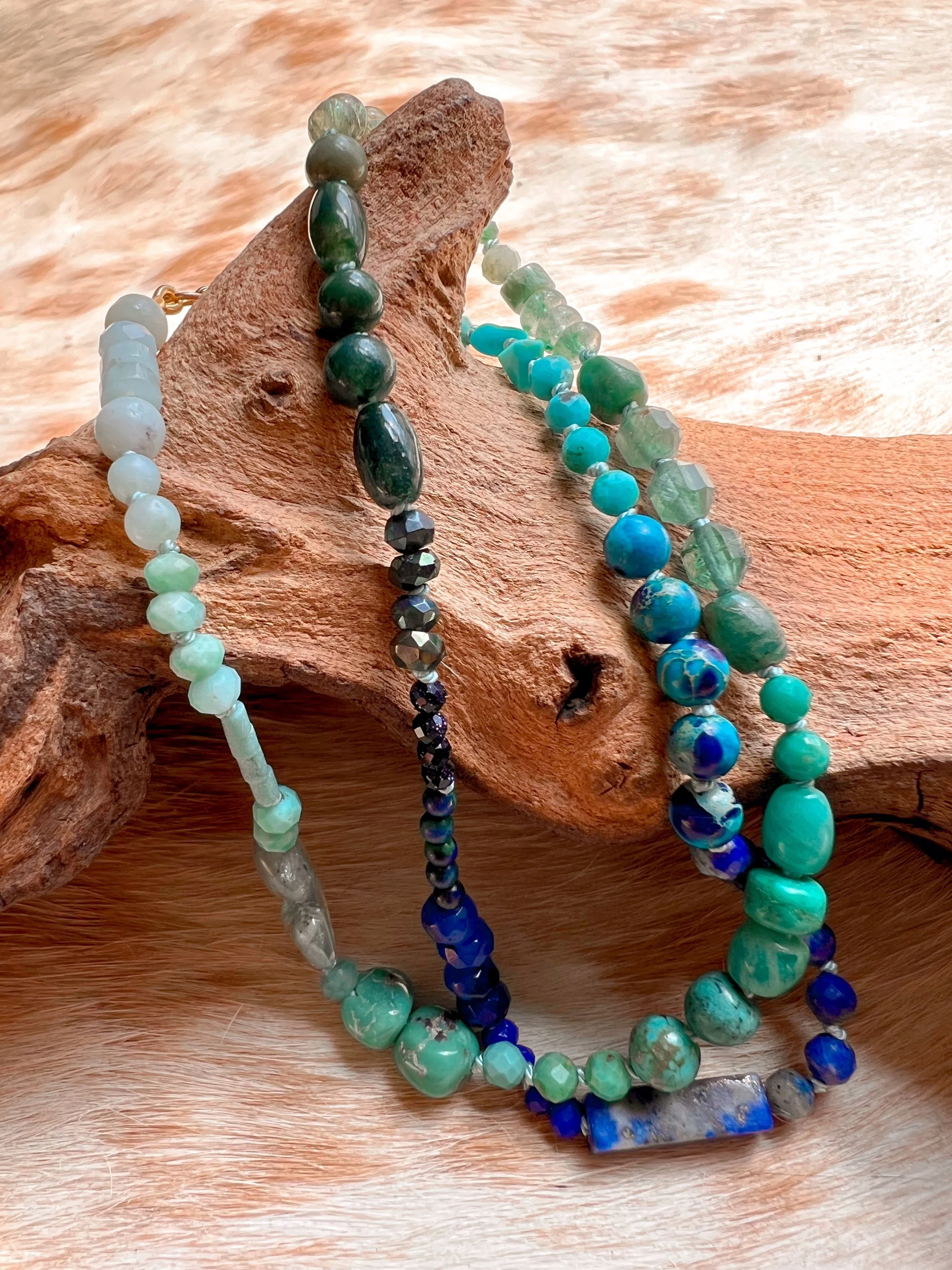Hand-knotted necklace on pure silk featuring colorful gemstone beads